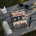 Notebook with "Football Chemistry" Japan theme, featuring cities and team slogans.