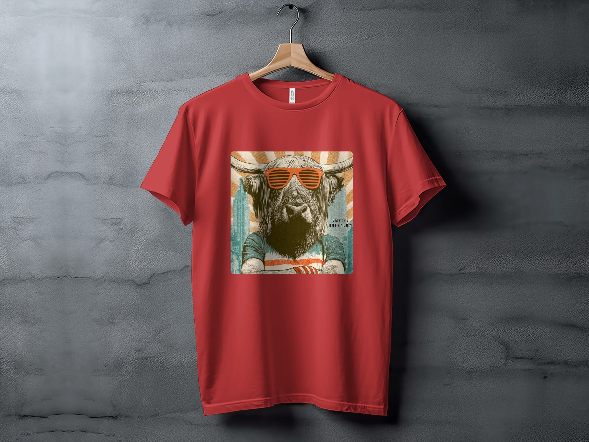 Red t-shirt with a stylized highland cow wearing sunglasses.
