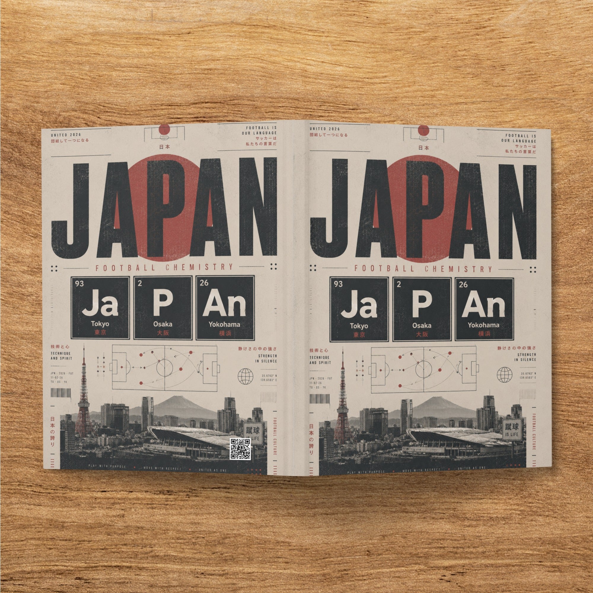 Two book pages with "JAPAN" repeated, featuring cityscape and soccer-themed graphics.