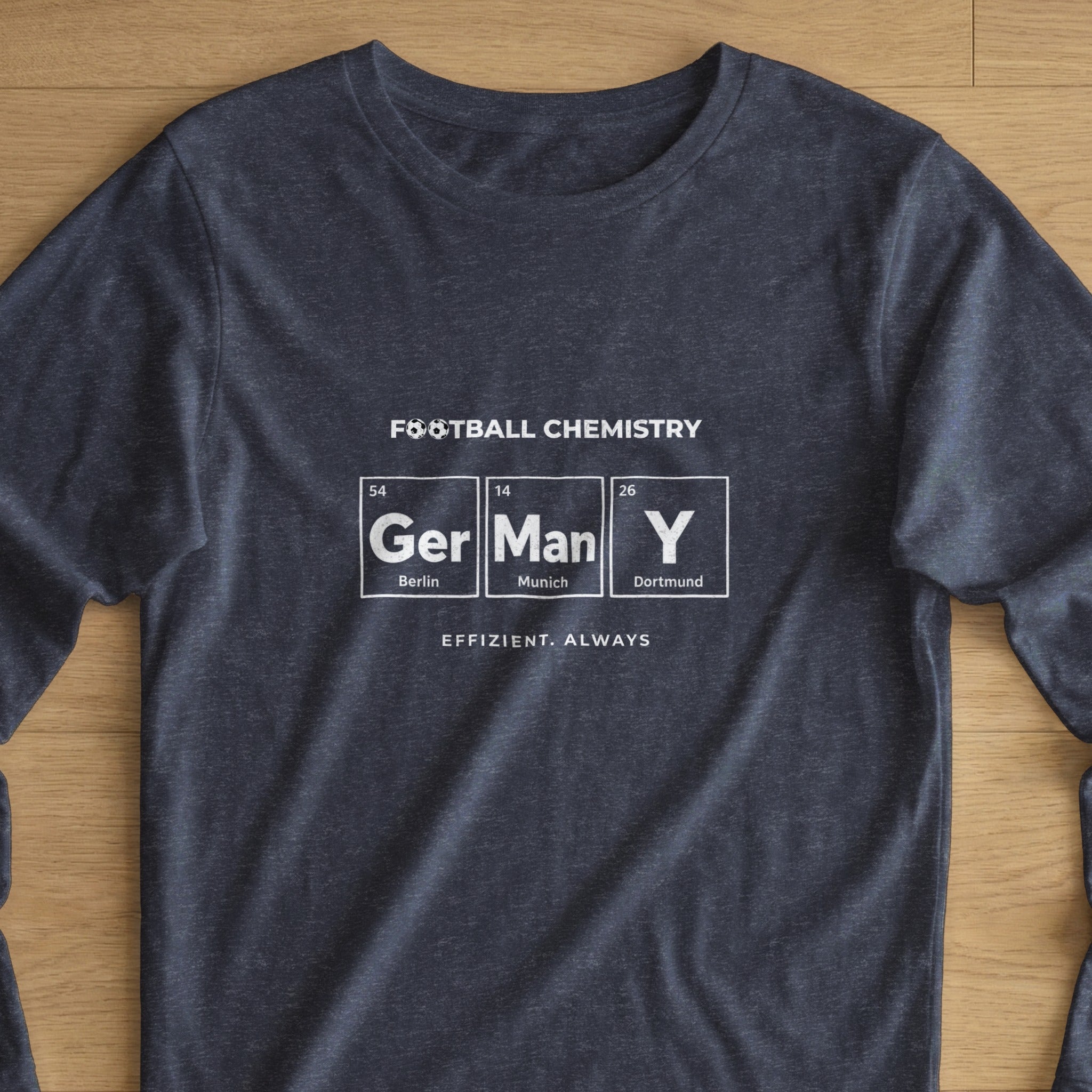 Dark t-shirt with "Football Chemistry" design, featuring periodic table elements for Berlin and Dortmund.