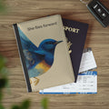 She Flies Forward passport holder with deep horizon botanical bird design, black faux leather with RFID blocking