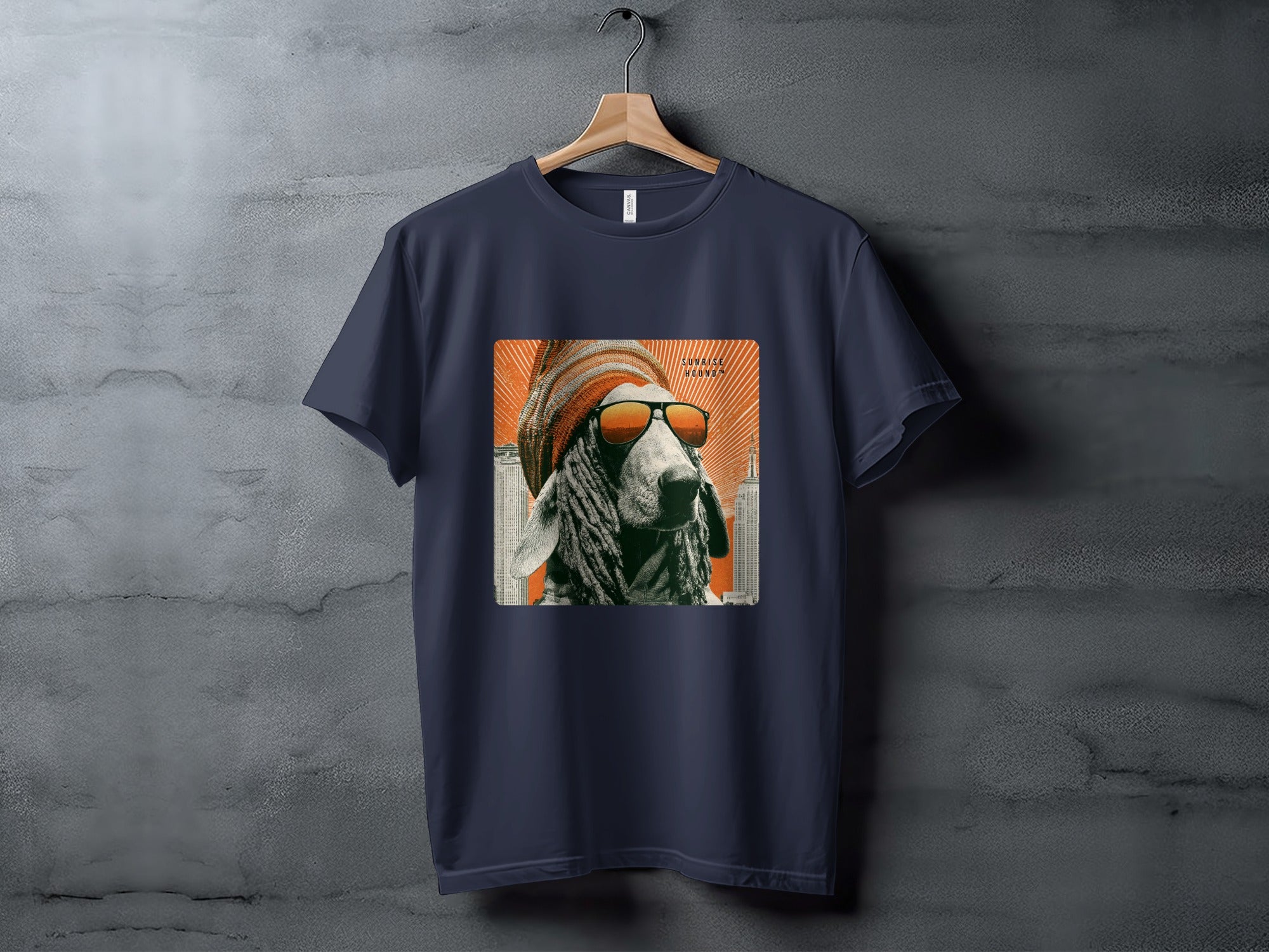 Navy t-shirt featuring a graphic of a sheep wearing sunglasses and an orange beanie.
