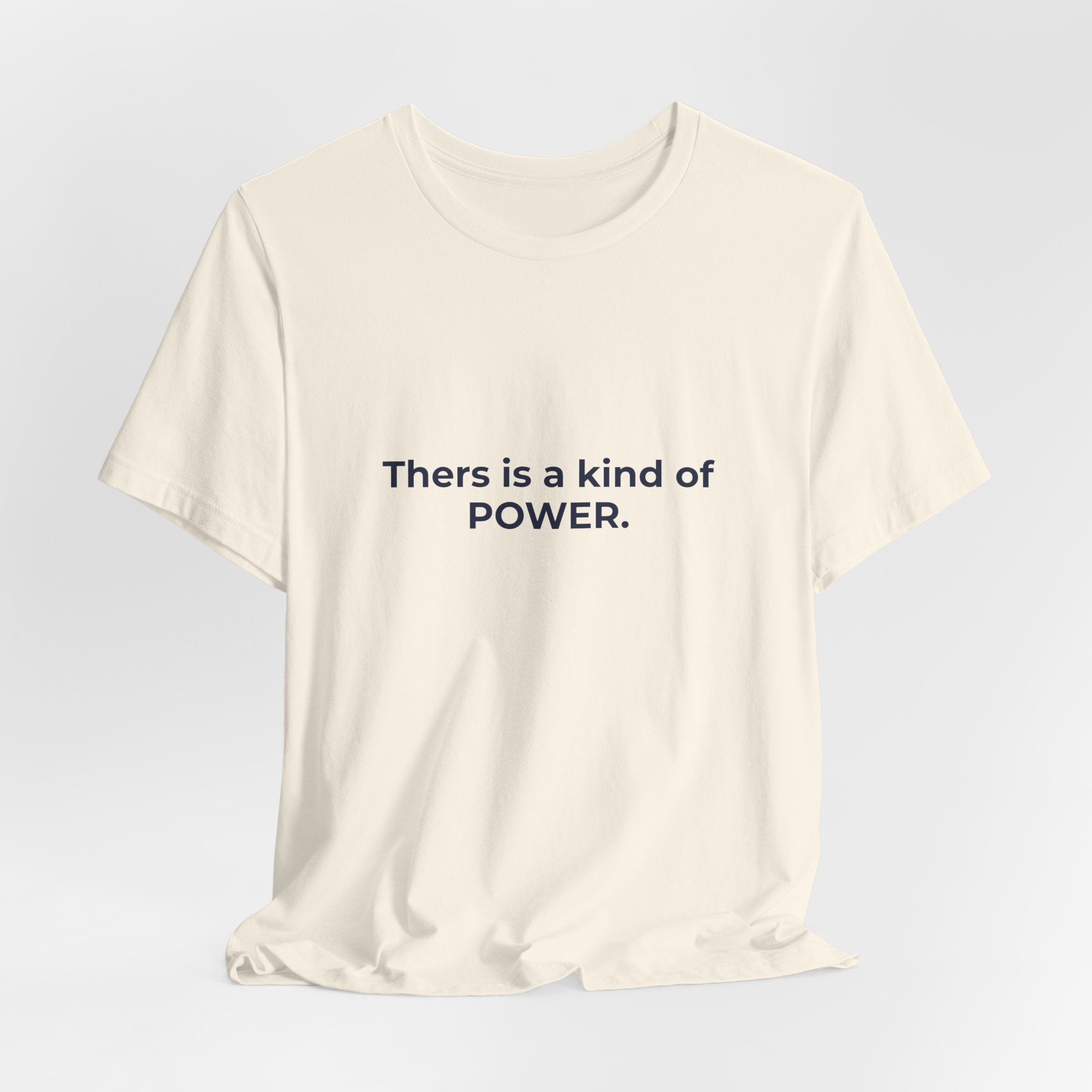 There is a kind of power that does not announce itself. | Women's Motivational T-Shirt