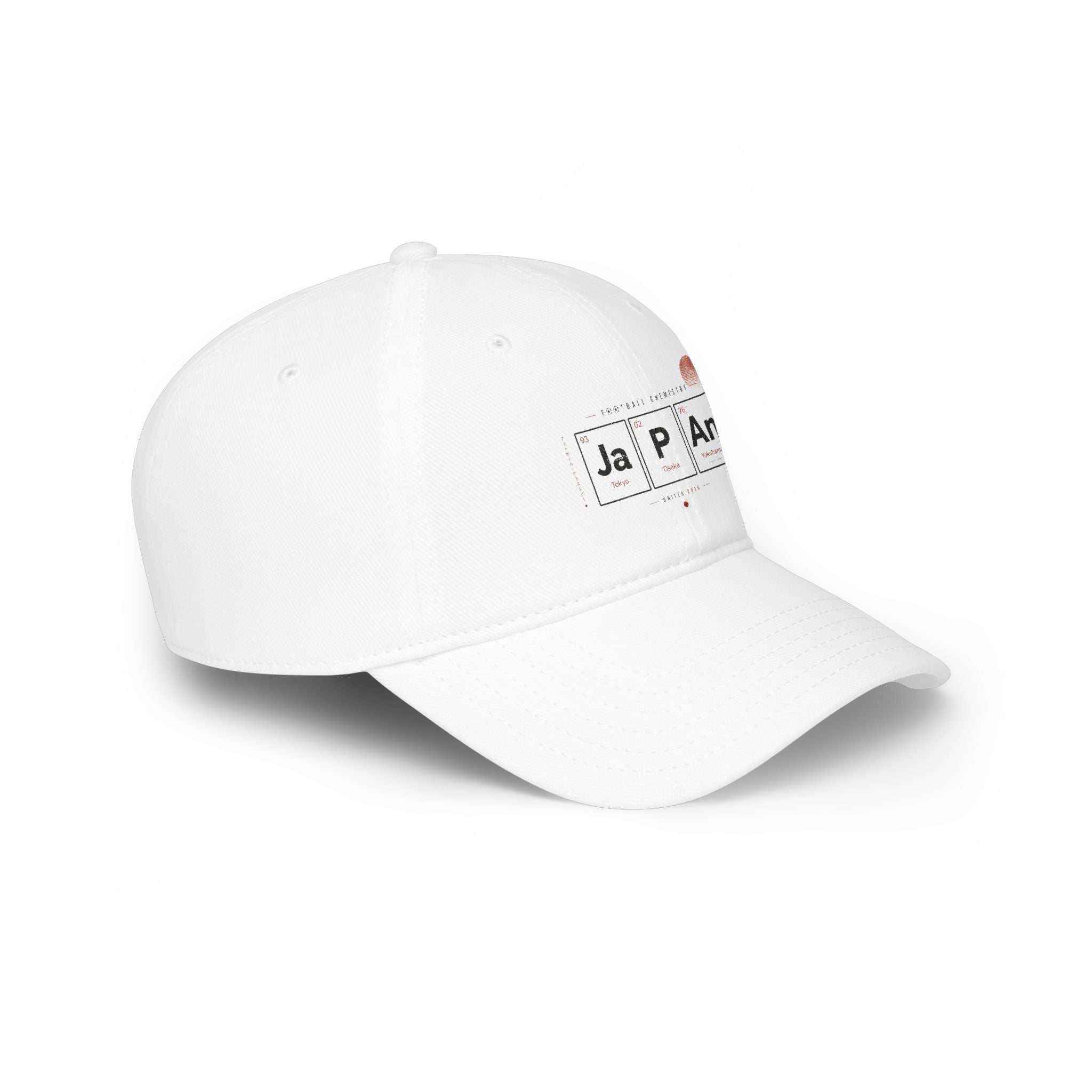 White baseball cap with "FOOTBALL ENS." and "JA PA N" text in periodic table style.