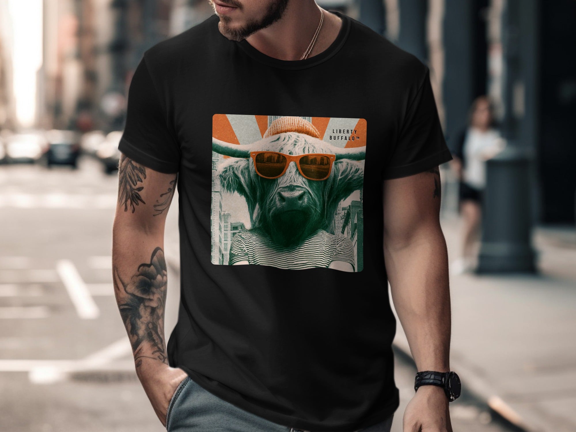 Buffalo wearing sunglasses and baseball cap on black t-shirt.