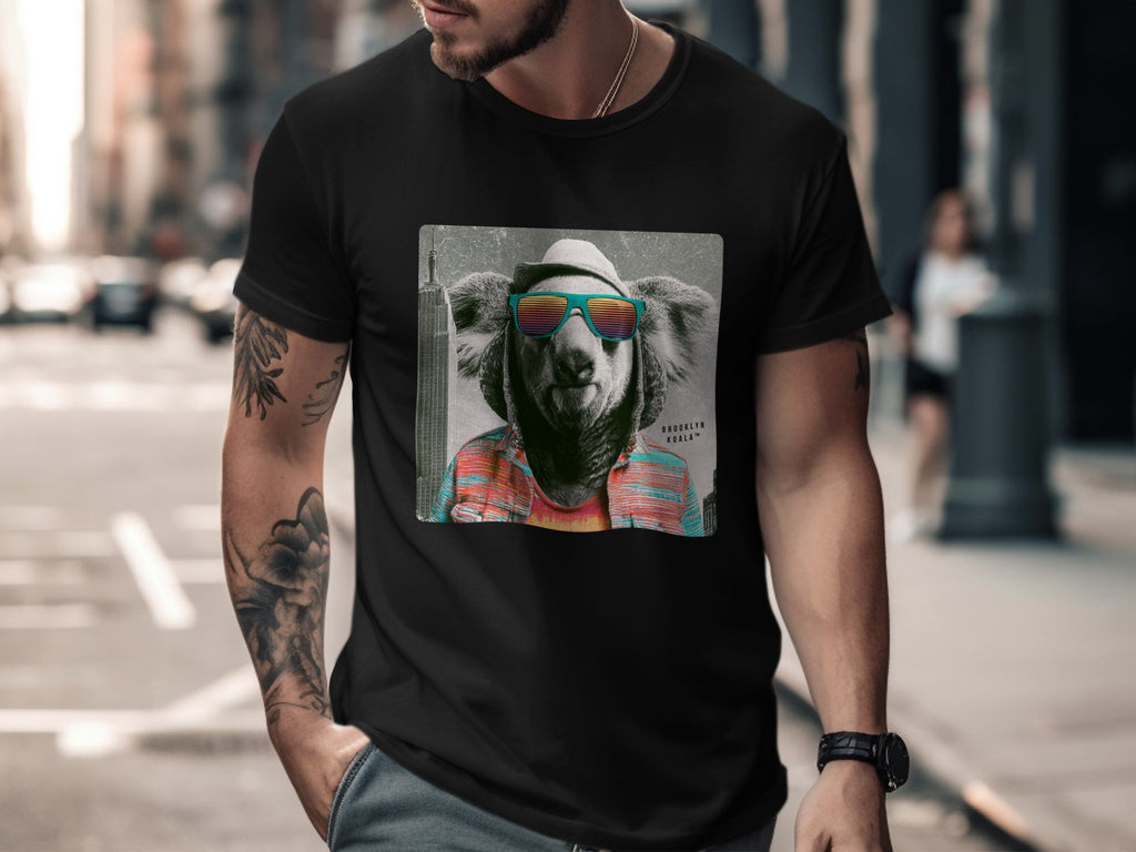 Koala wearing sunglasses and a colorful striped shirt on a black t-shirt.