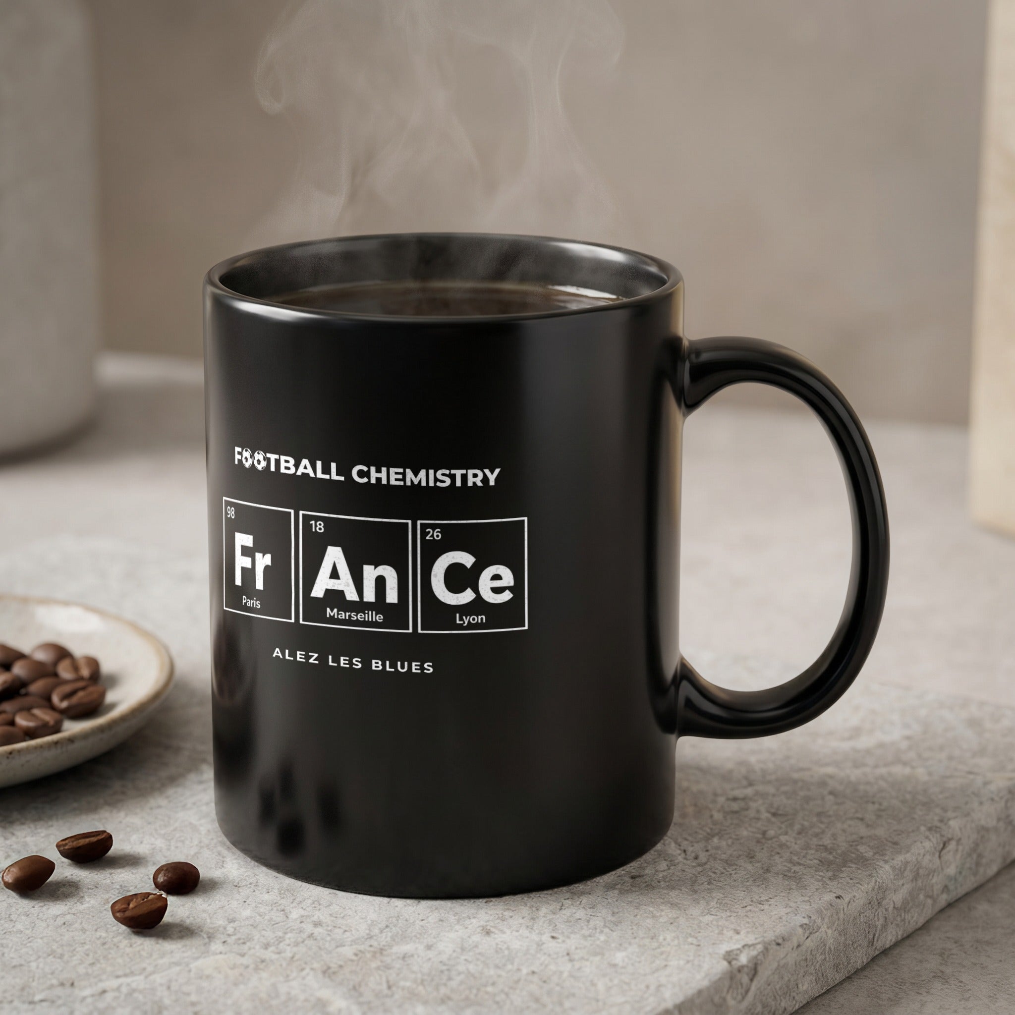 Black mug with "FOOTBALL CHEMISTRY" and periodic table elements for "Fr" and "An".