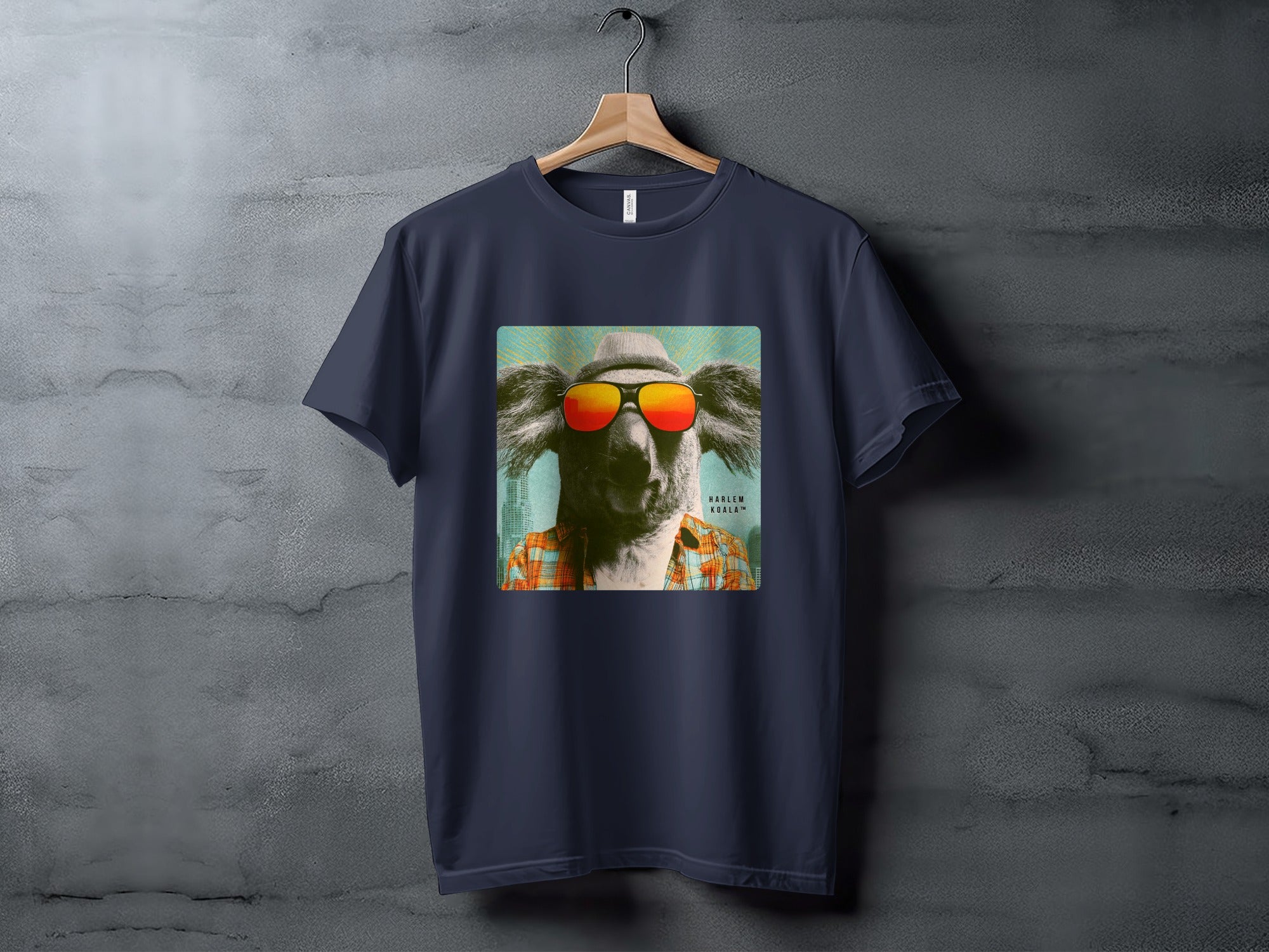 T-shirt featuring a stylized koala wearing sunglasses and a hat.