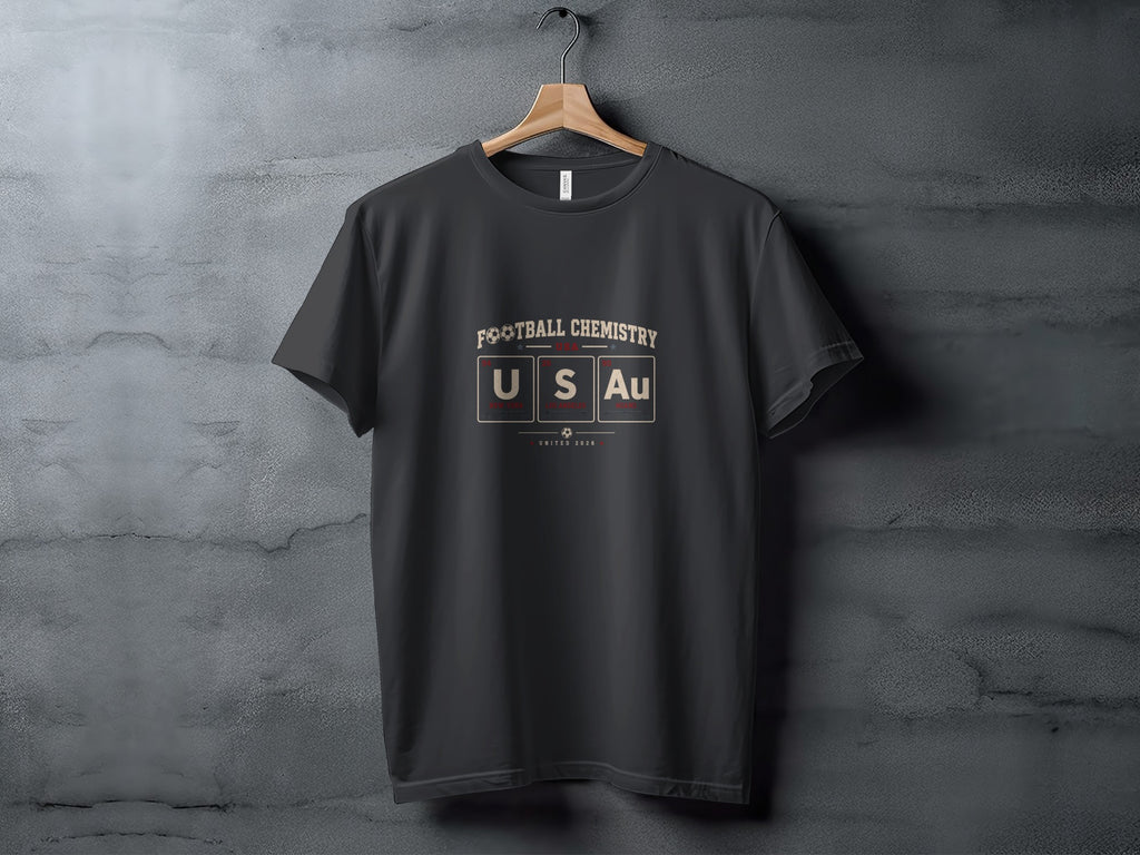 Dark t-shirt with "FOOTBALL CHEMISTRY USA" and elemental symbols for gold.
