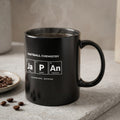 Black mug with "FOOTBALL CHEMISTRY" and "JAPAN" in periodic table style, coffee beans.