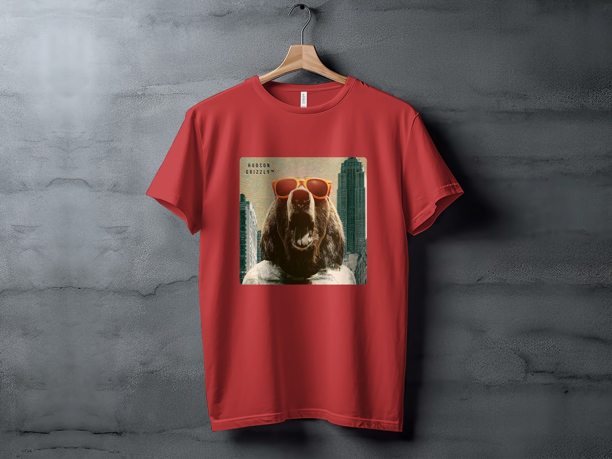 Red t-shirt with sunglasses-wearing bear head graphic and "HUDSON GRIZZLY" text.