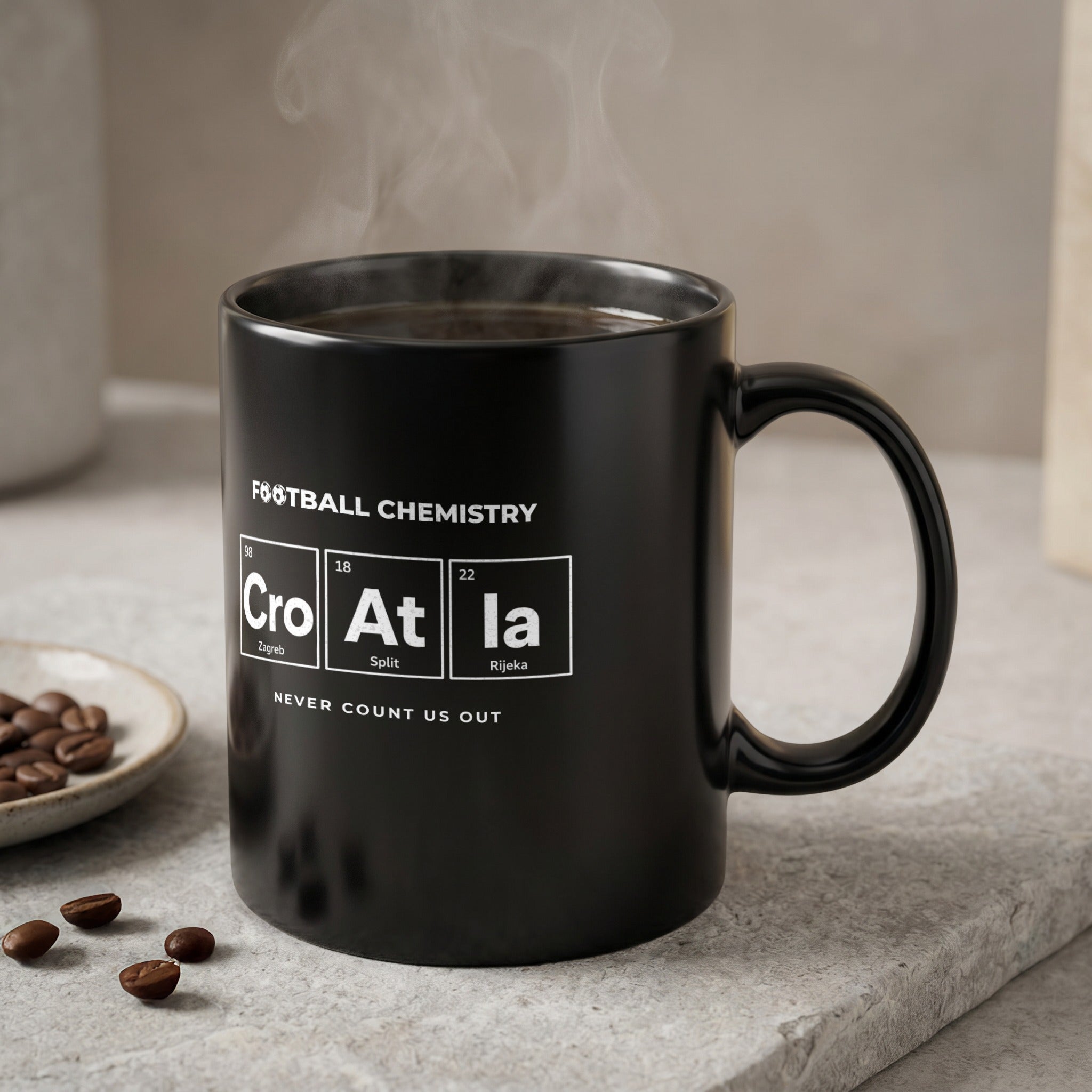 Black mug with "Football Chemistry" and Croatian cities in periodic table format.