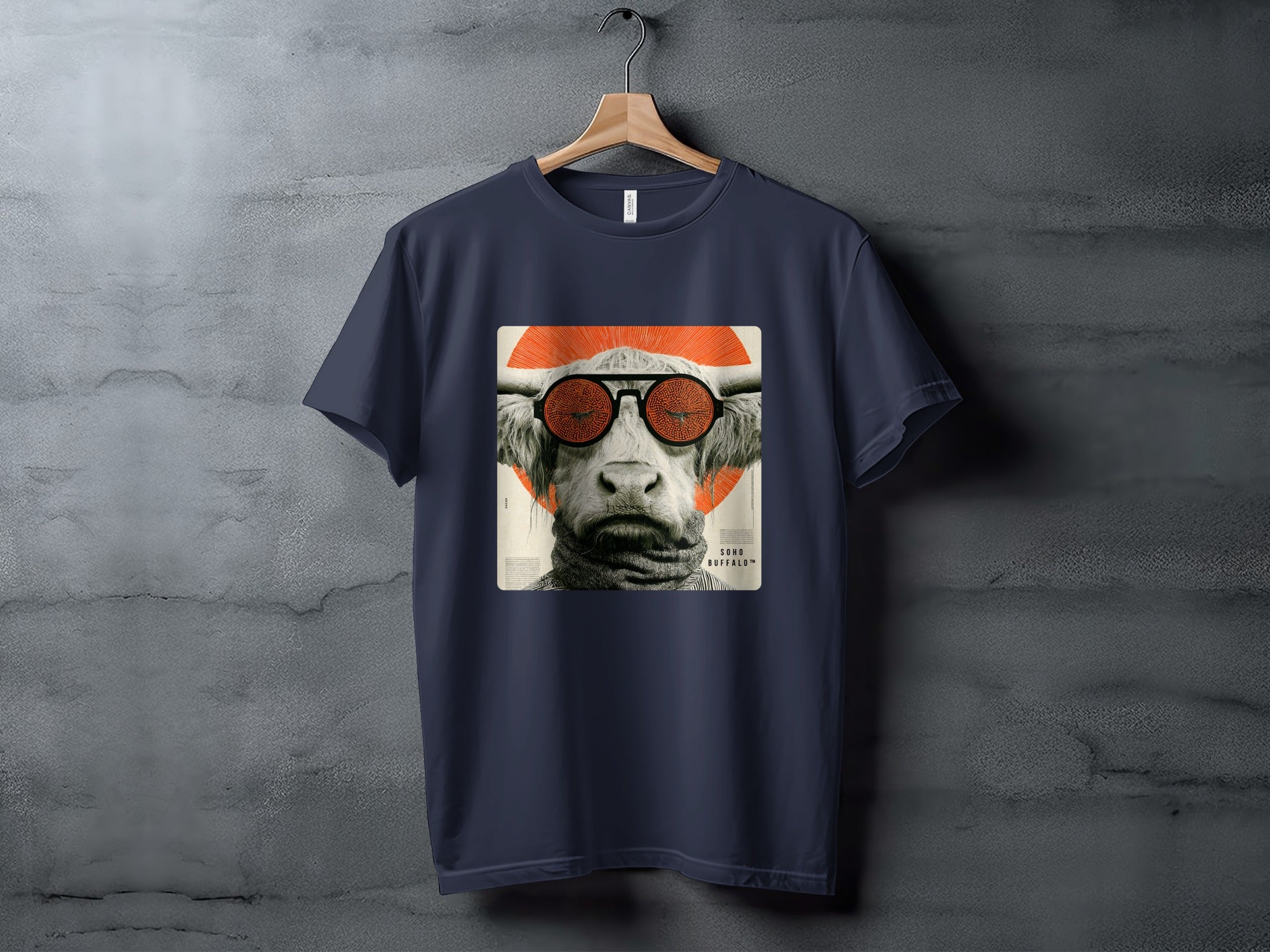 Navy t-shirt with a bull wearing sunglasses on a concrete background.