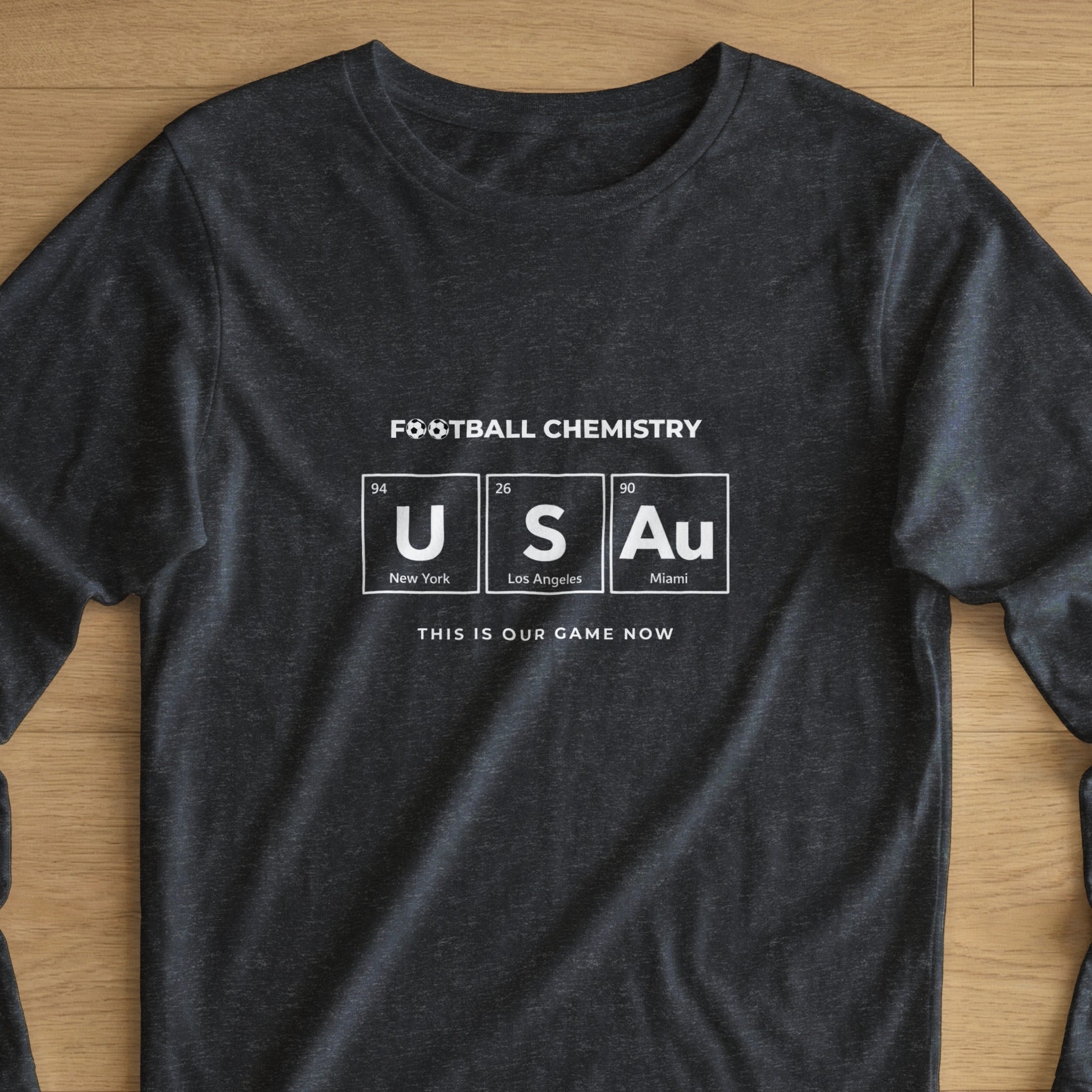 Dark t-shirt with "Football Chemistry USAu" and city names.