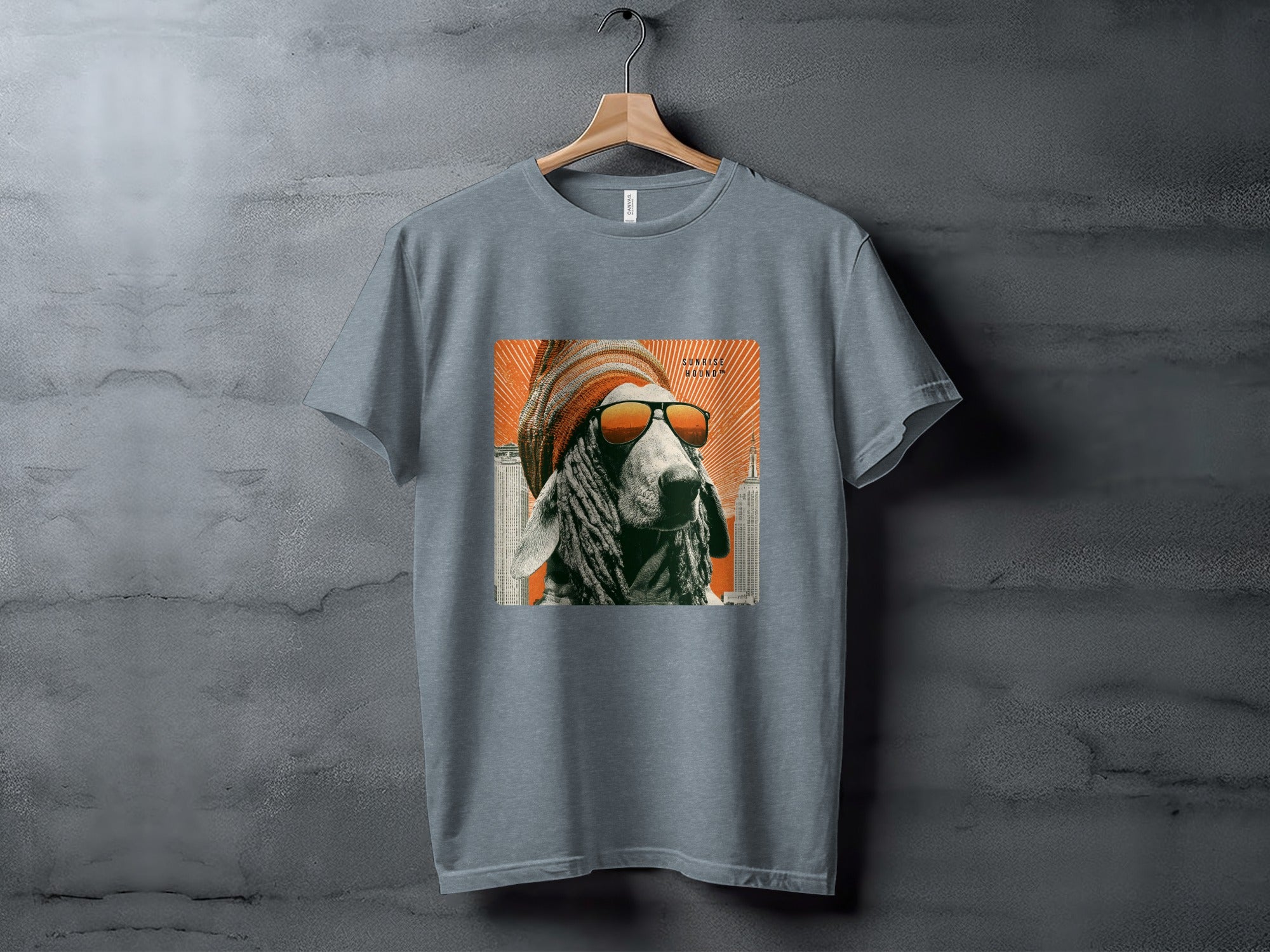 T-shirt featuring a goat wearing sunglasses and a beanie against a city backdrop.
