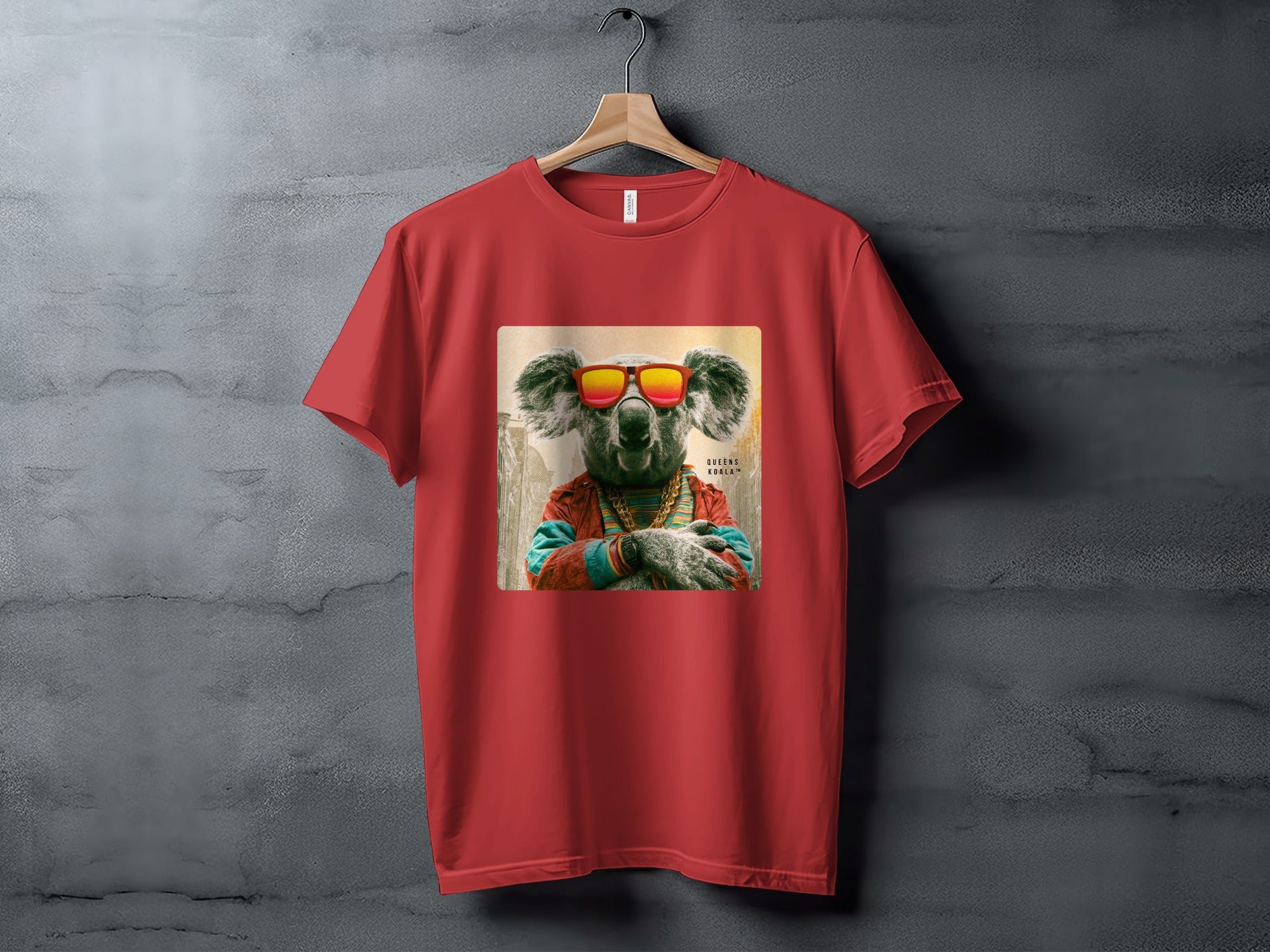 Red t-shirt with a stylized koala wearing sunglasses and a jacket.