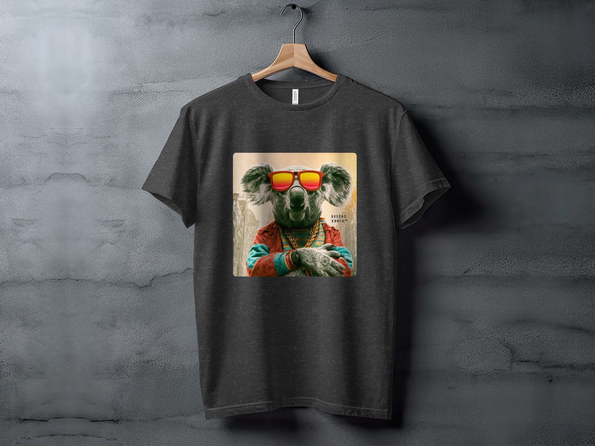 Koala wearing sunglasses and colorful jacket, printed on dark t-shirt.