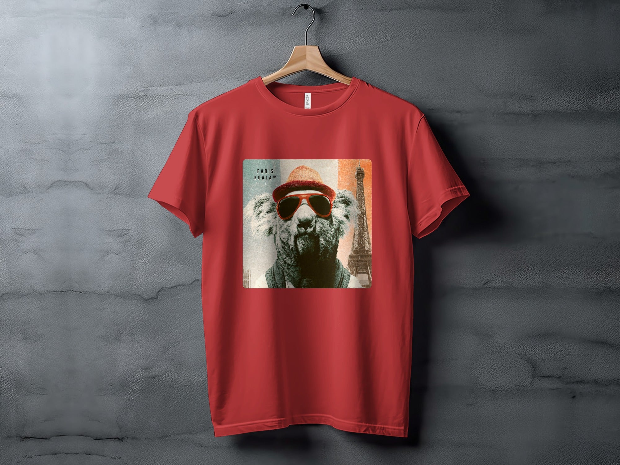 Red t-shirt featuring a koala wearing sunglasses with the Eiffel Tower in the background.