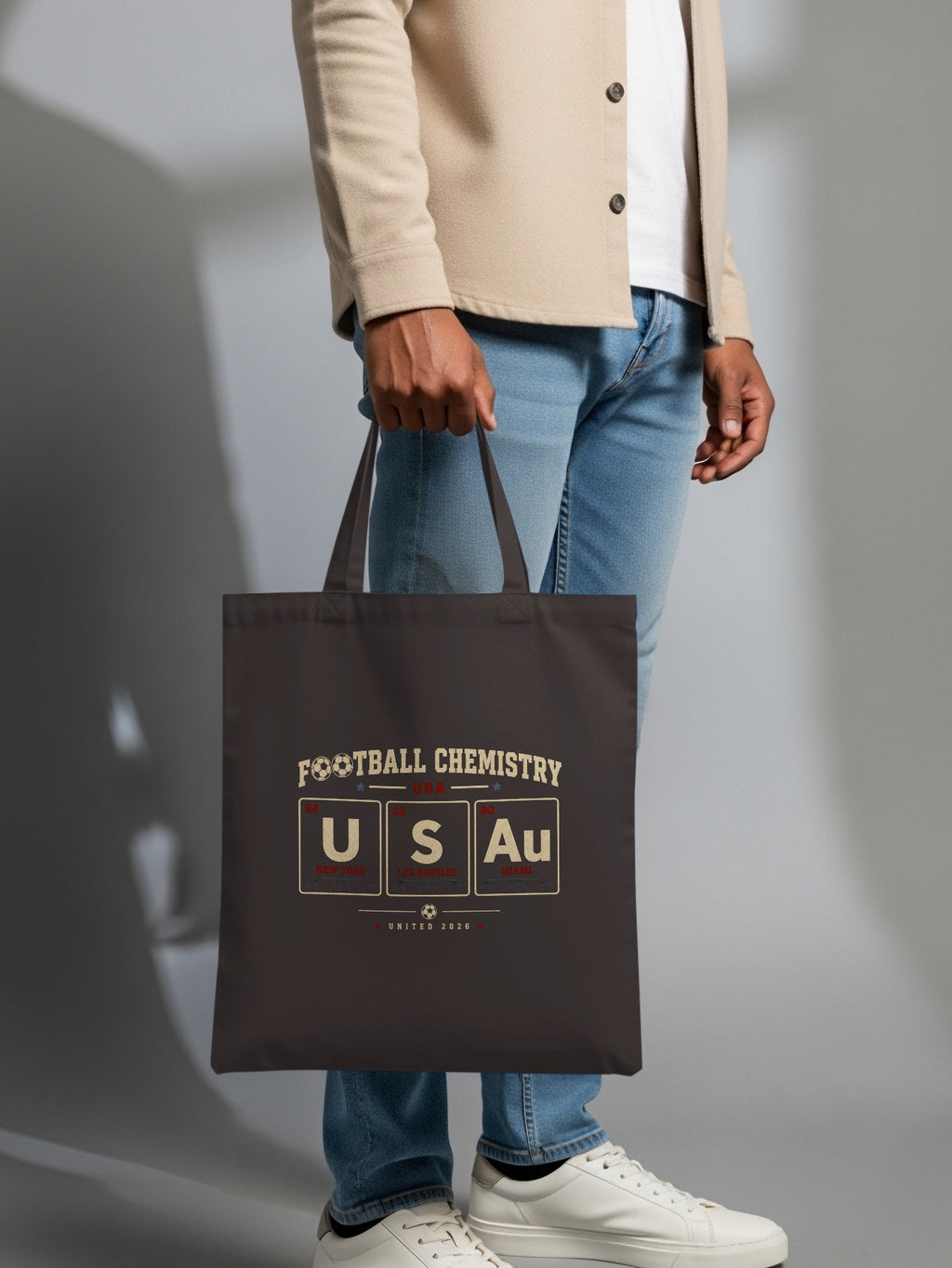 Tote bag with "Football Chemistry USA Au" text and periodic table elements.