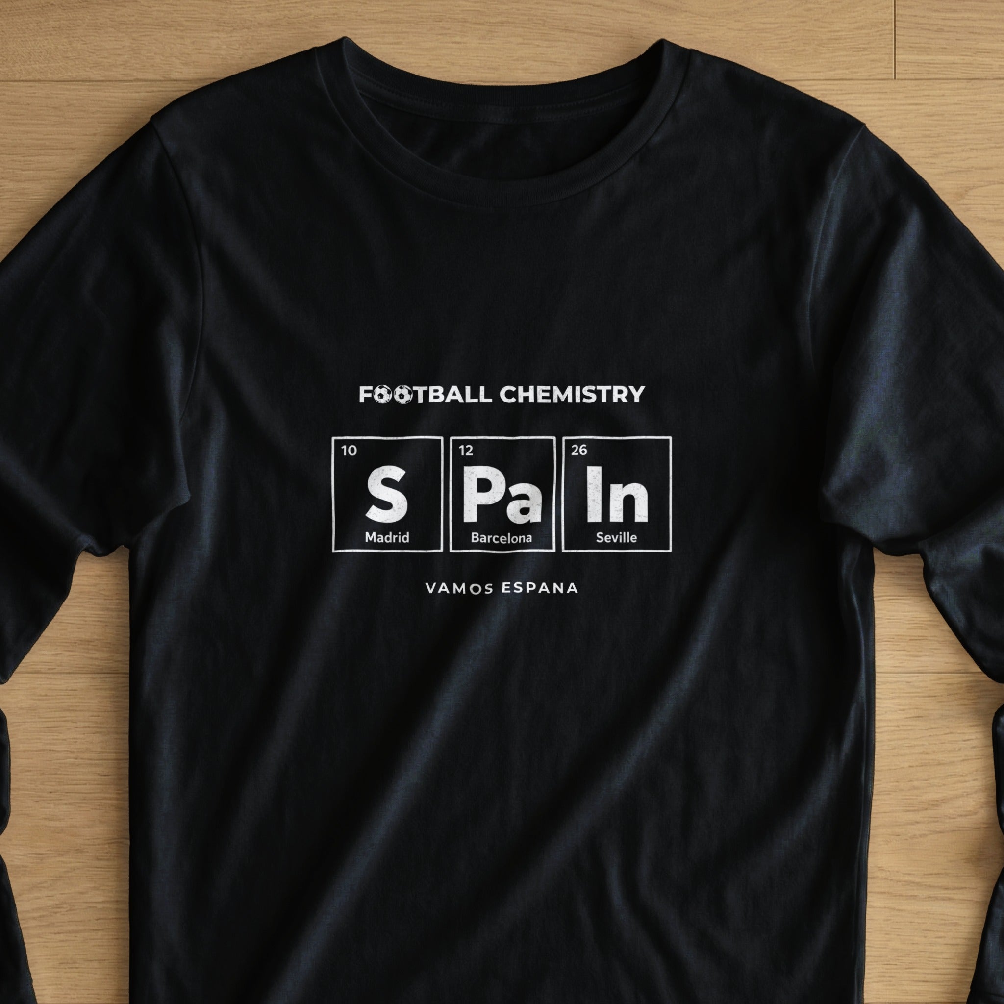 Black t-shirt with "Football Chemistry Spain" design in white text.