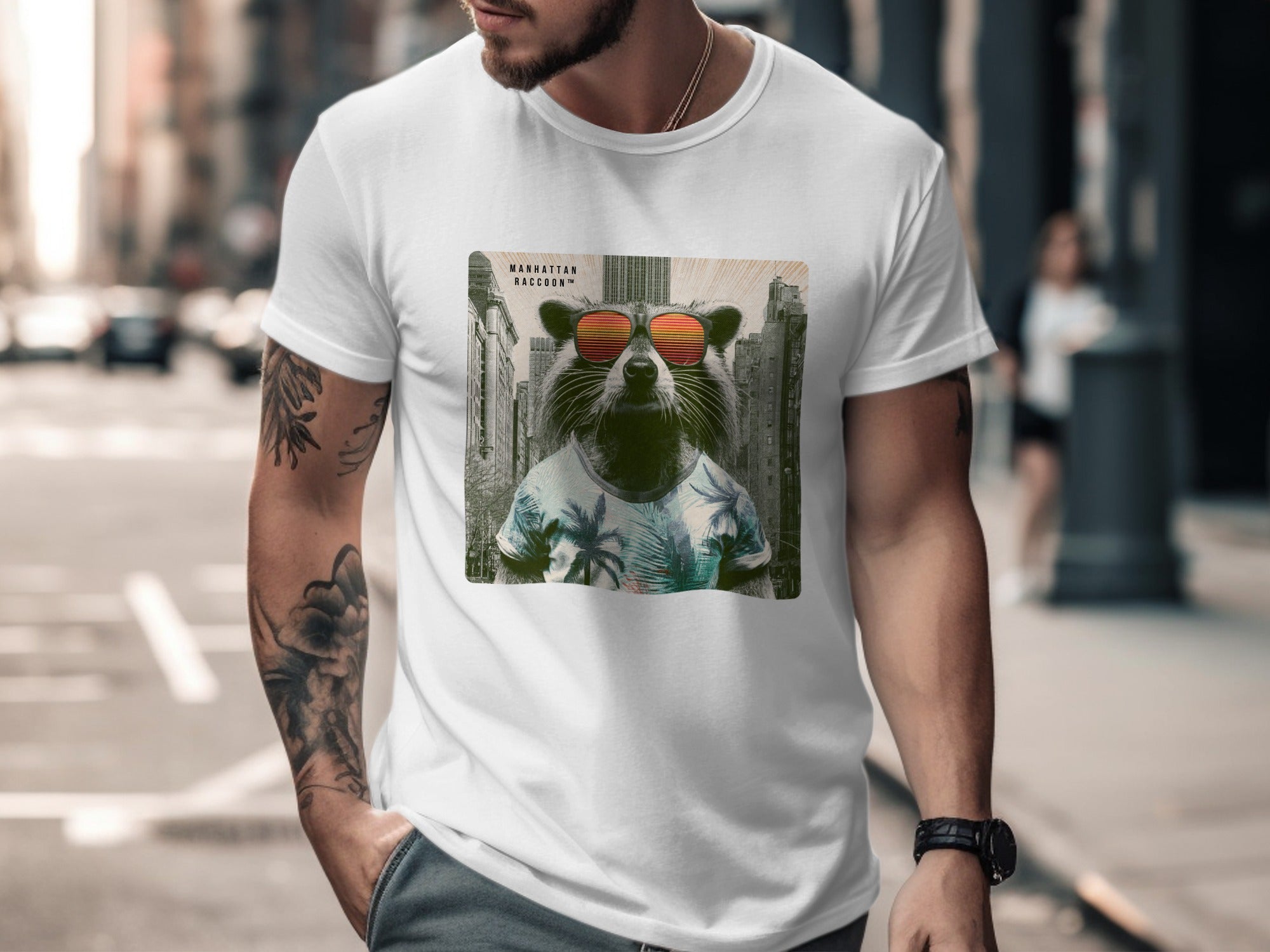 White t-shirt featuring a raccoon wearing sunglasses and a tropical shirt.