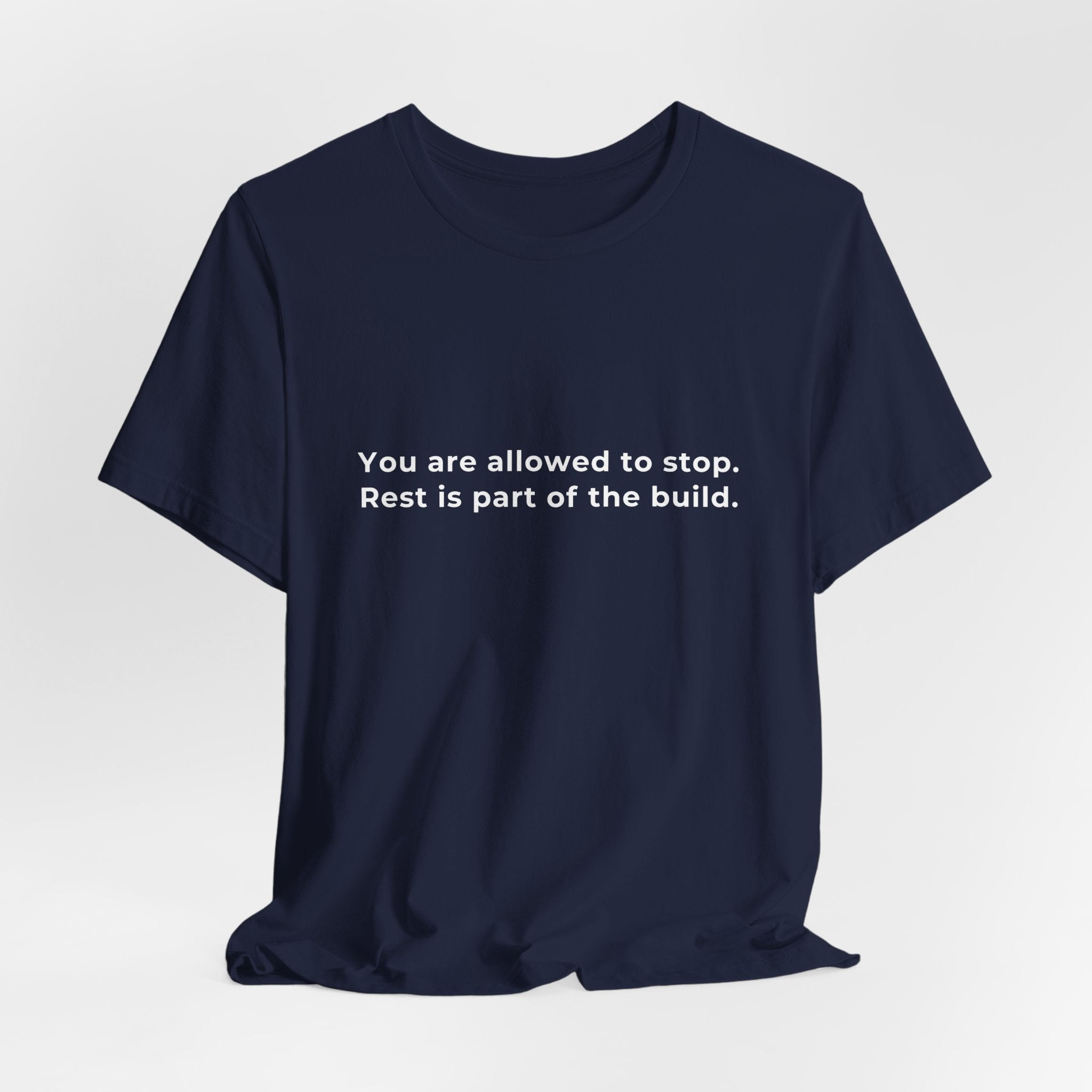 "You are allowed to stop. Rest is part of the build." Tee — Men's Motivational Short Sleeve Shirt