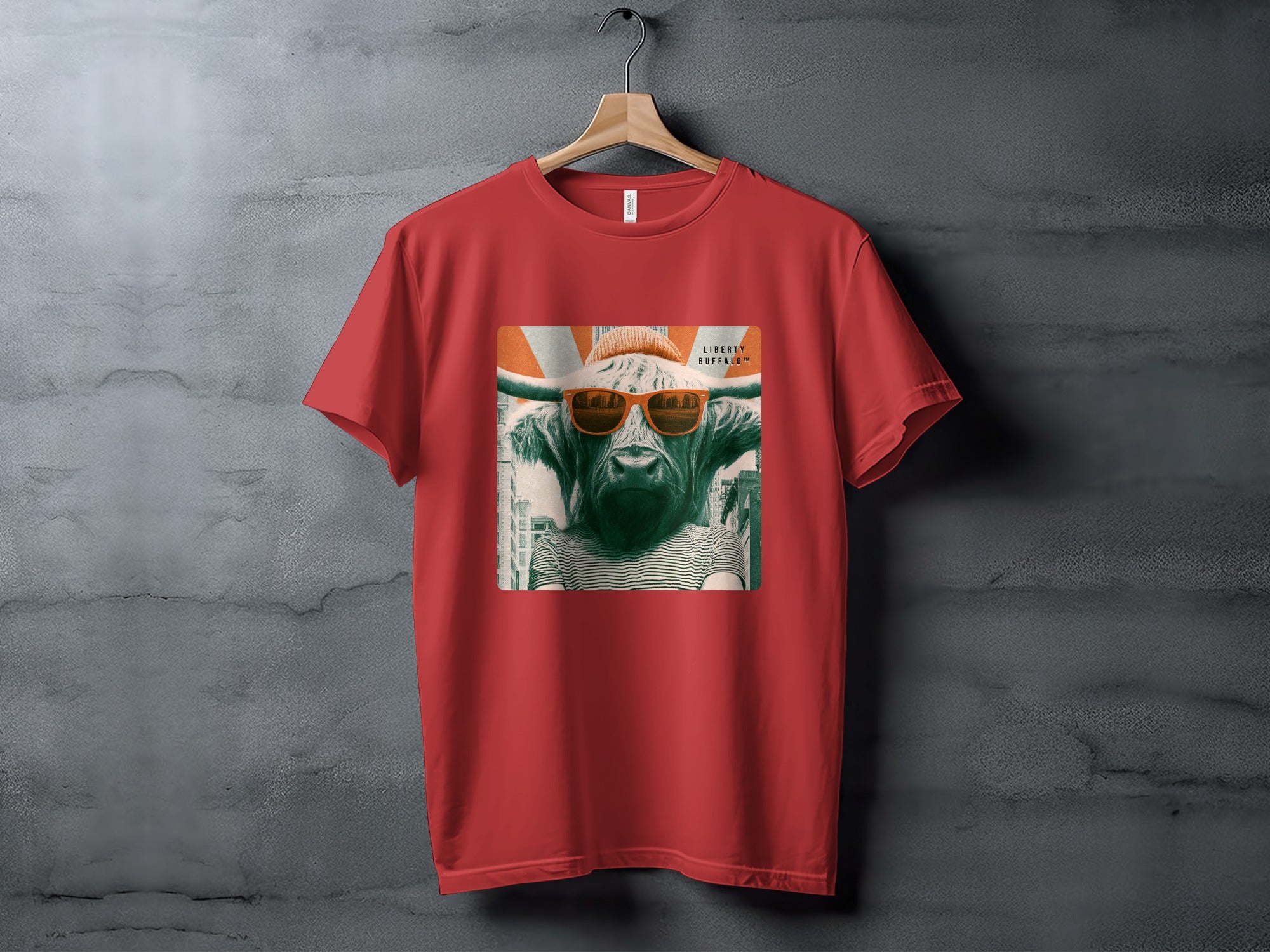 Red t-shirt with a graphic of a bull wearing sunglasses and a beanie.