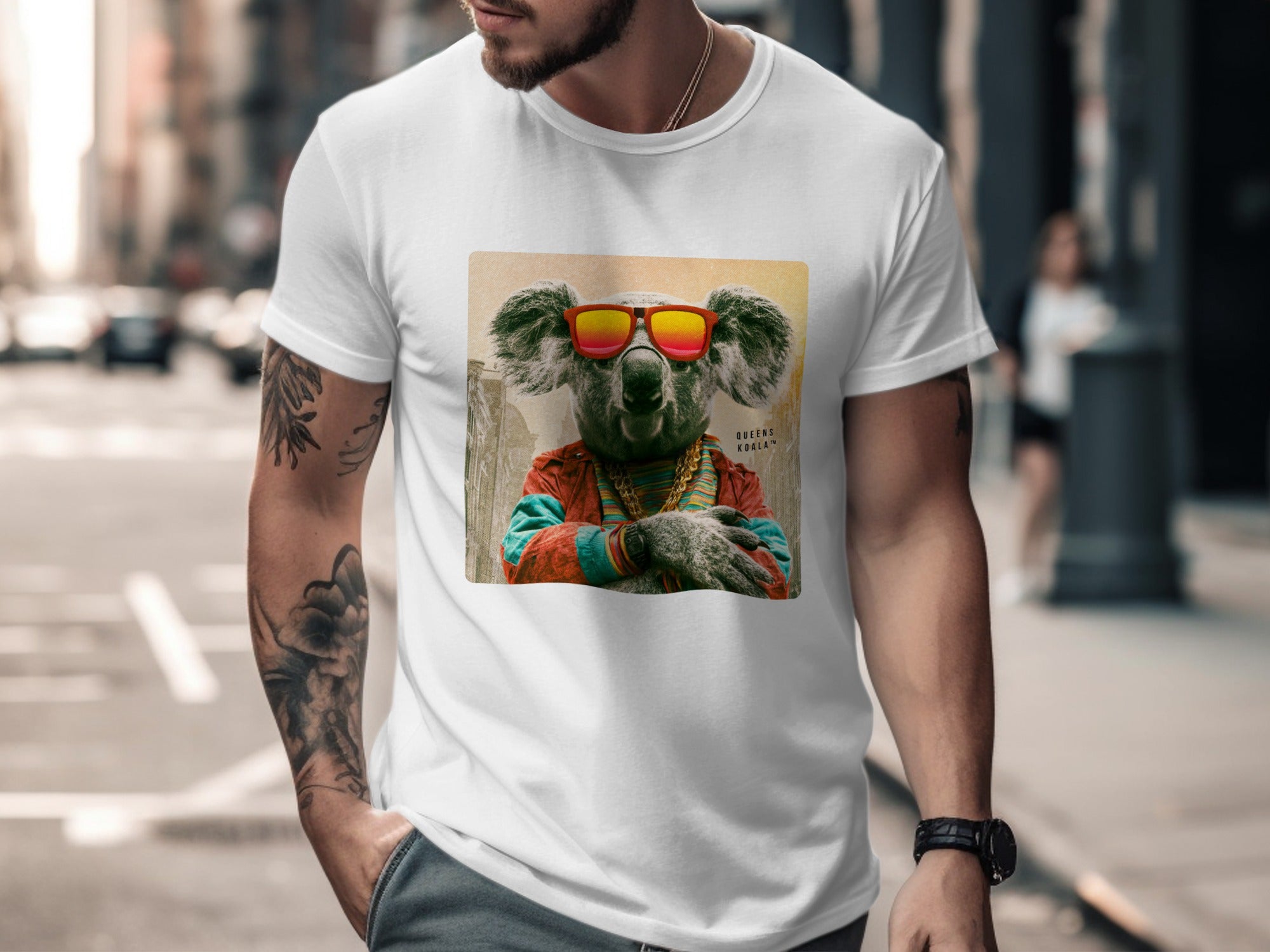 T-shirt with graphic of a koala wearing sunglasses and gold chains.