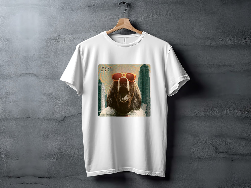 White t-shirt featuring a bear wearing sunglasses against a city skyline.