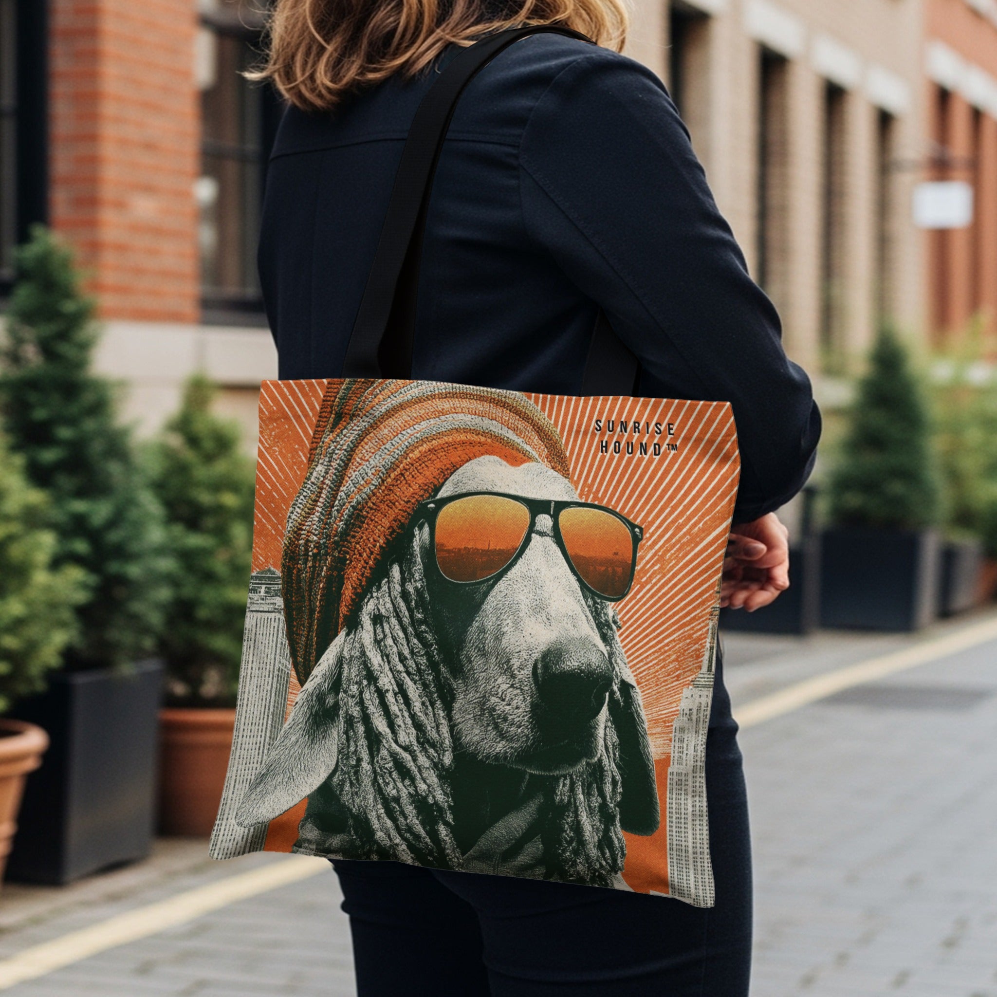 Tote bag with illustration of a dog in sunglasses and hat, with "Sunrise Hound" text.