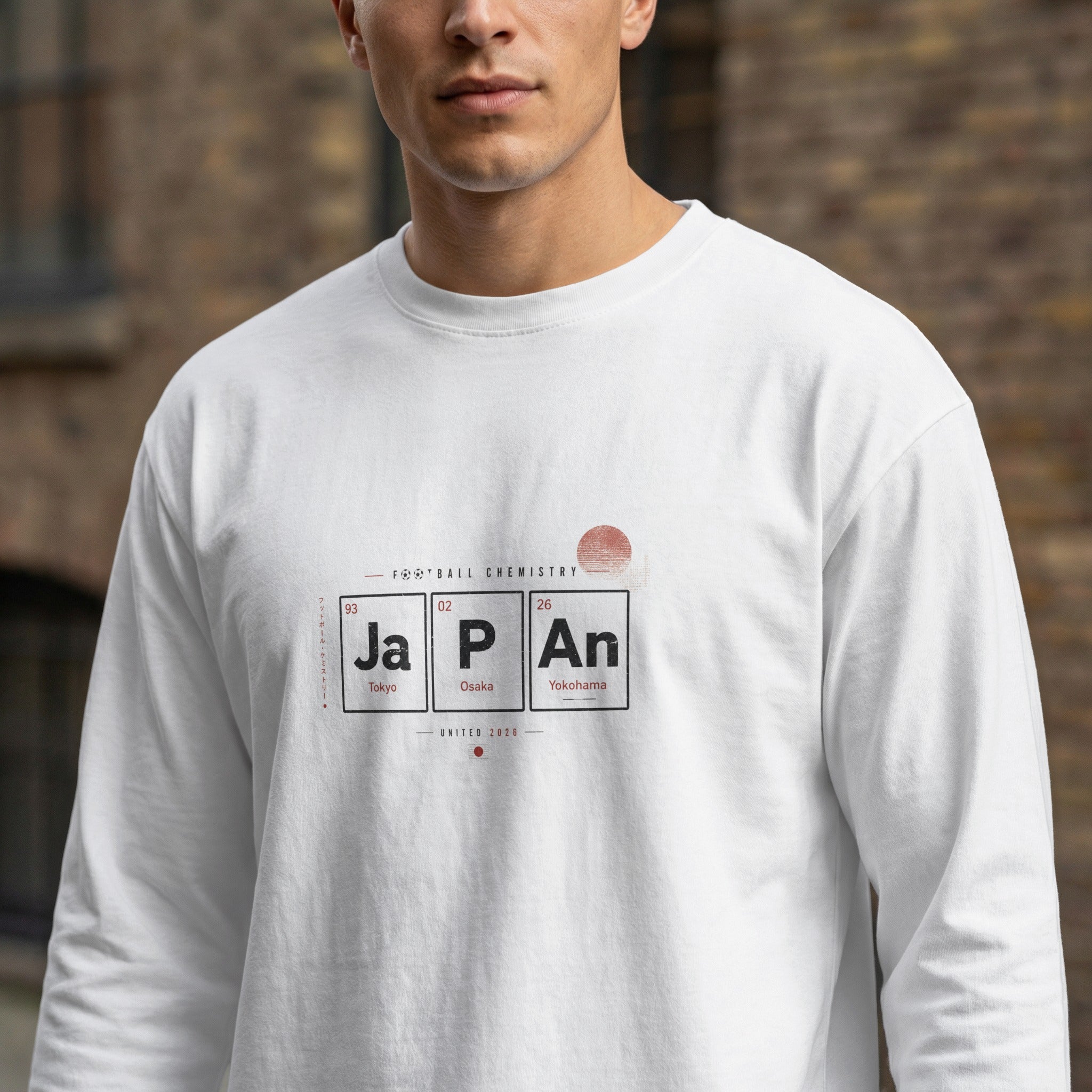 Long-sleeve shirt with "Japan" in periodic table elements, featuring city names.
