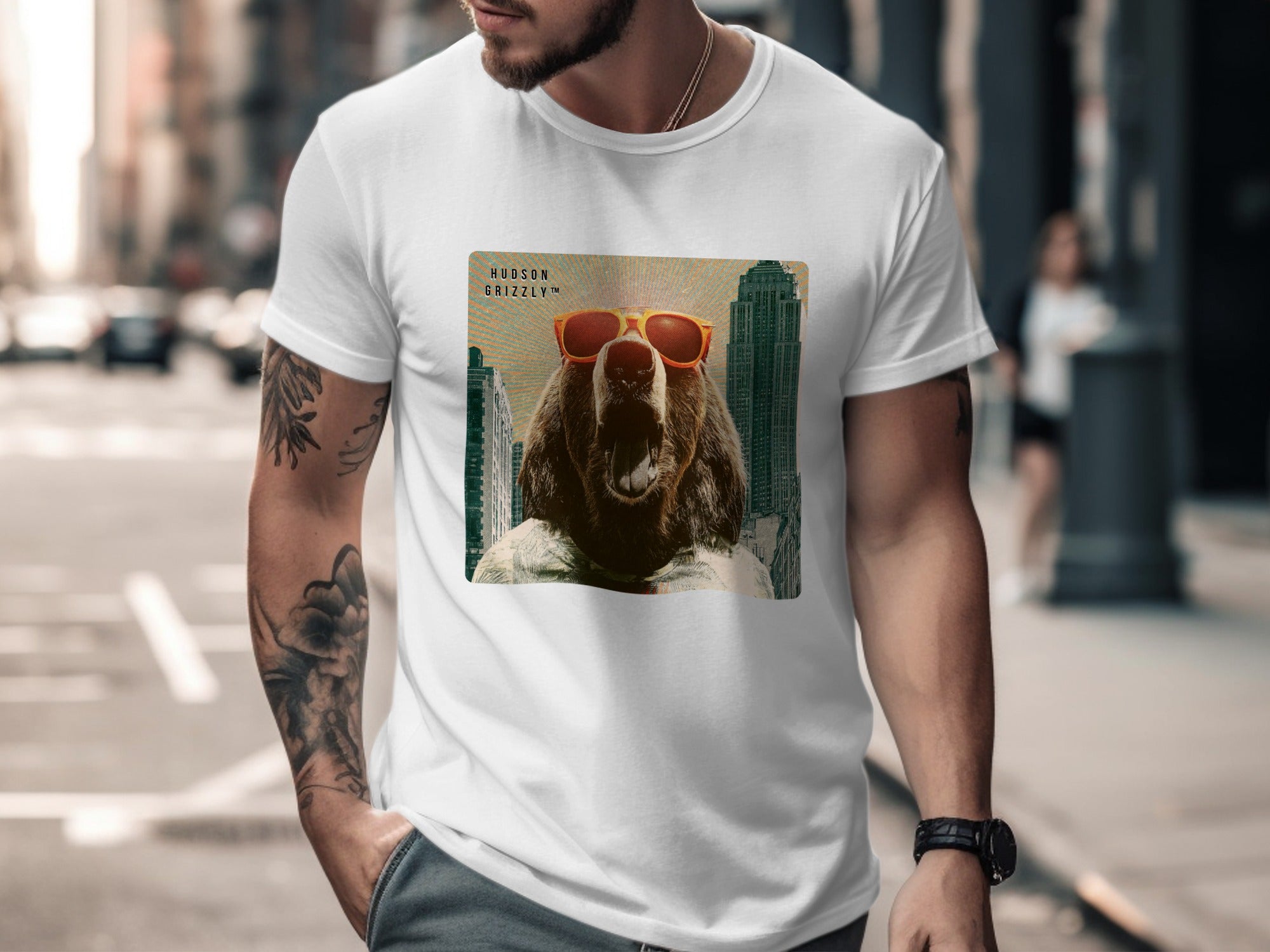 White t-shirt with grizzly bear wearing orange sunglasses.
