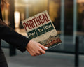 Portugal magazine cover with football team, cities, and quotes.