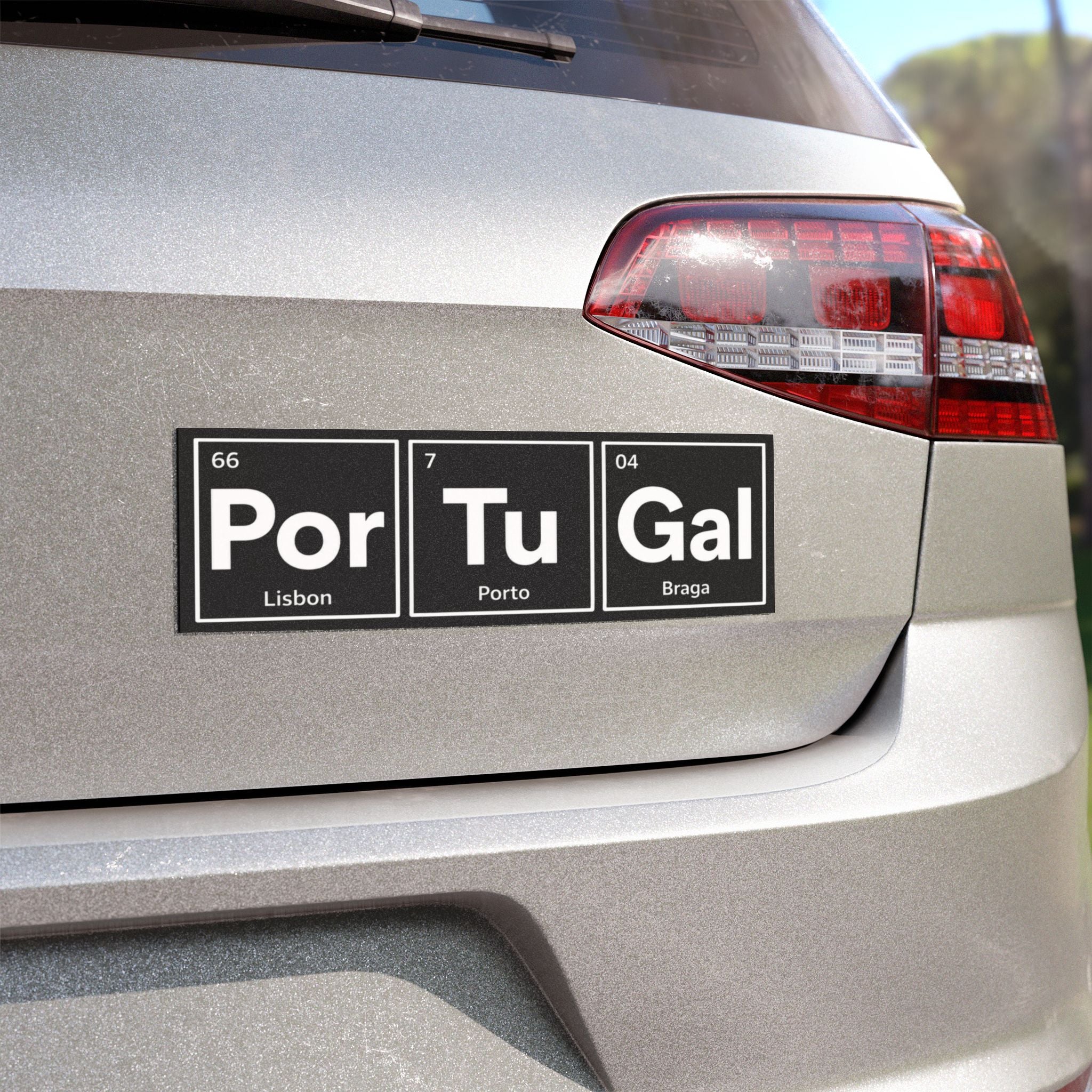 Car sticker with "Por Tu Gal" and city names Lisbon, Porto, Braga.