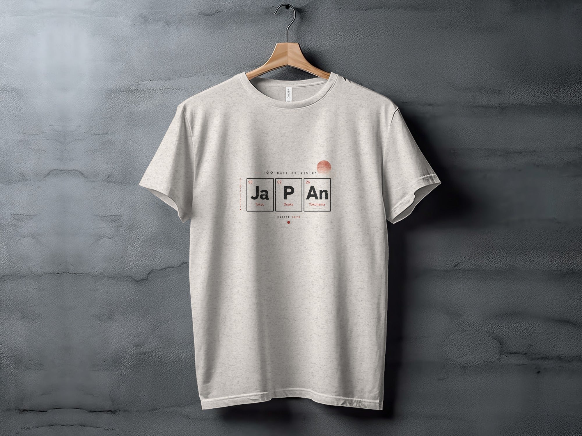 White t-shirt with "Japan" graphic resembling periodic table elements.