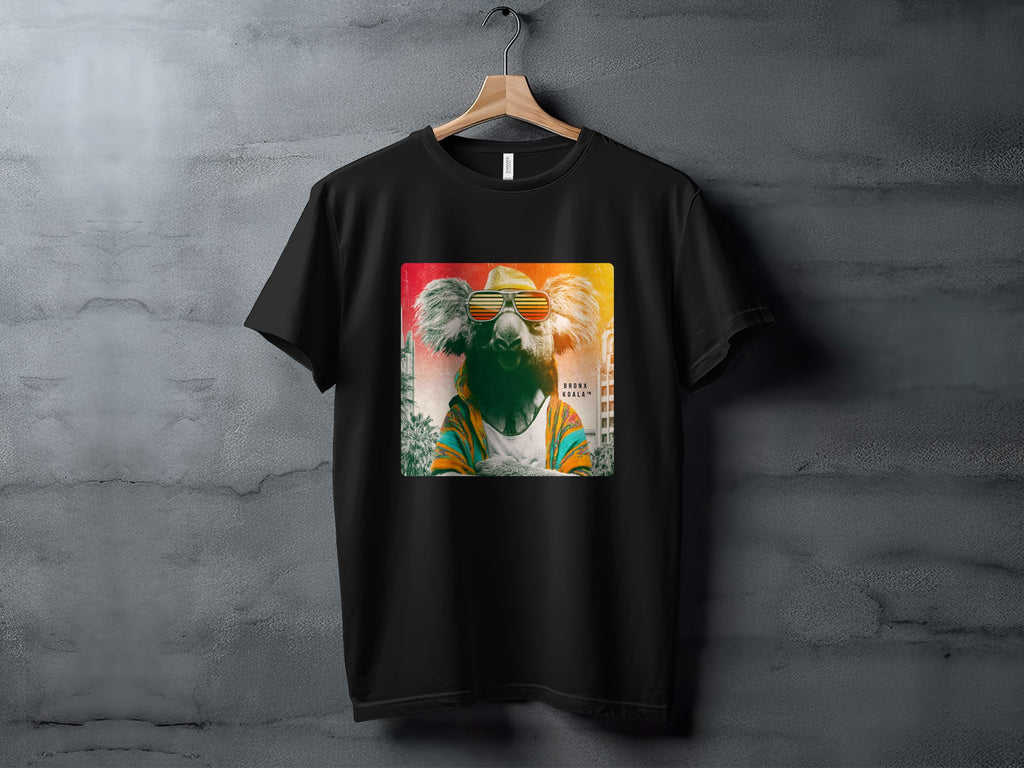 T-shirt with a cool koala wearing sunglasses and a colorful jacket.