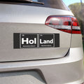 Black rectangle sticker with "Hol Land" in large white letters, Amsterdam and Rotterdam below.