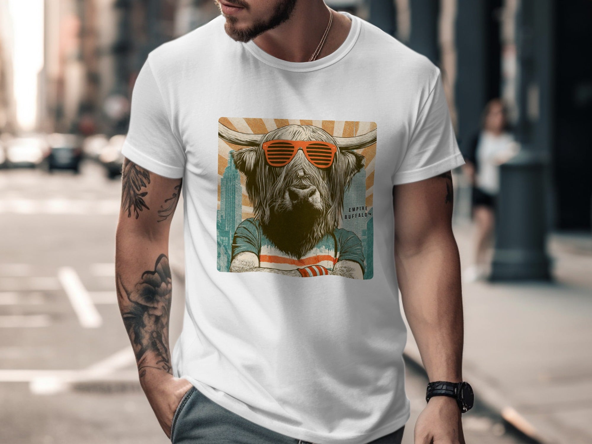 T-shirt graphic: buffalo wearing sunglasses, city skyline background.