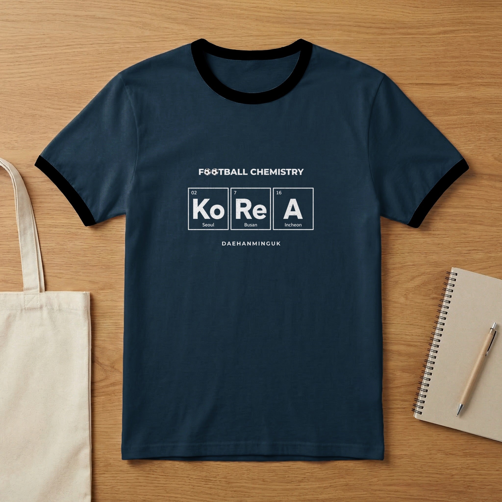 Dark t-shirt with "Korea" in periodic table style and "Daehanminguk" below.