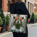 Tote bag featuring a raccoon wearing sunglasses and a tropical shirt.