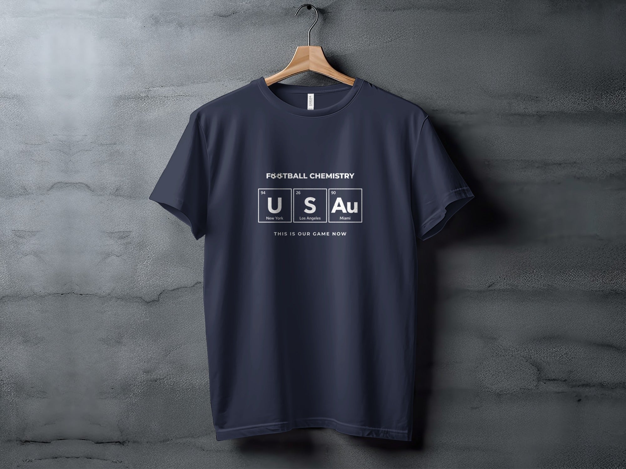 Navy t-shirt with "FOOTBALL CHEMISTRY USAu" and city names.