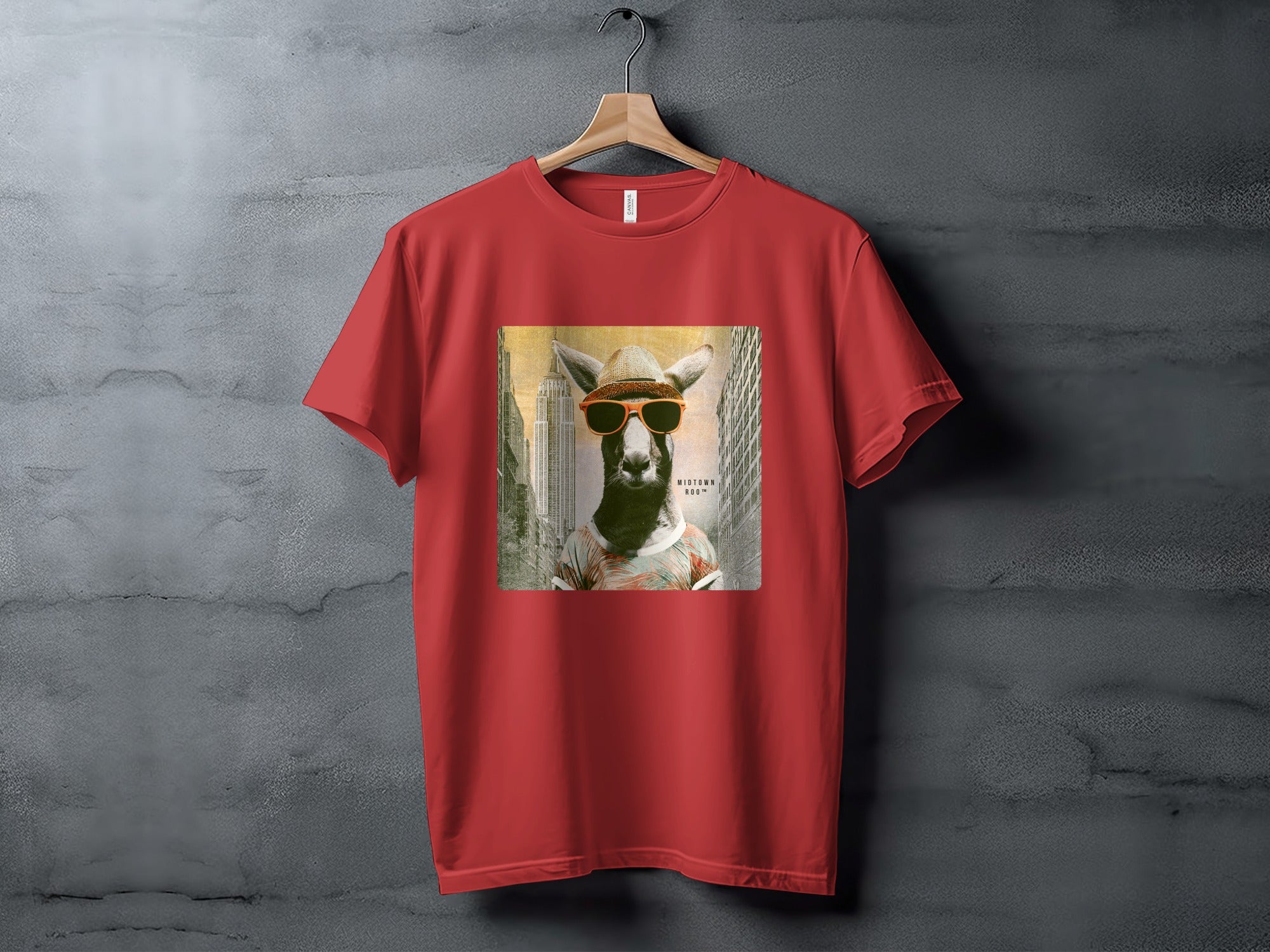 Red t-shirt with a kangaroo wearing sunglasses and a tie in front of a city skyline.