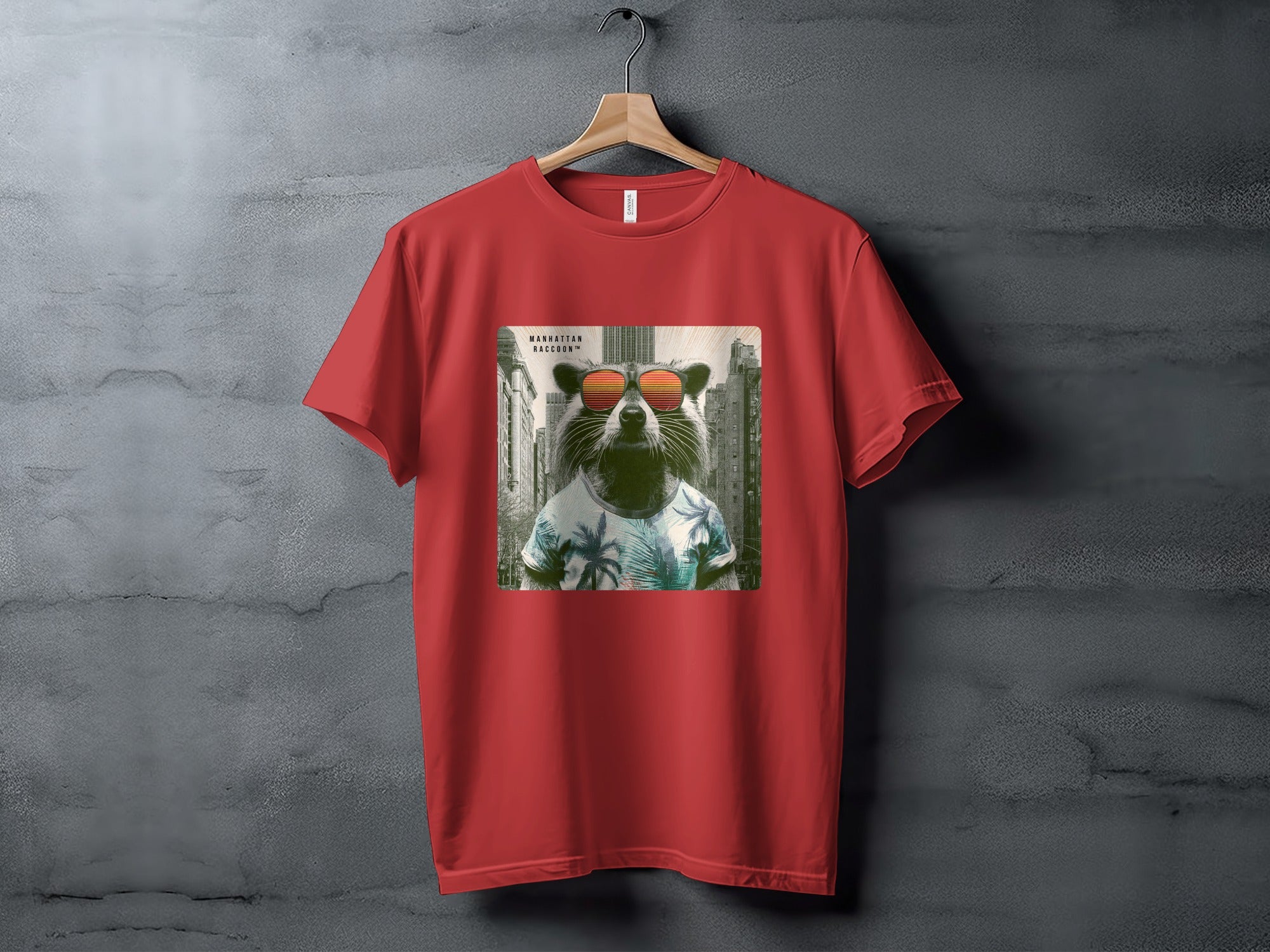 Red t-shirt with graphic of raccoon in sunglasses and Hawaiian shirt.