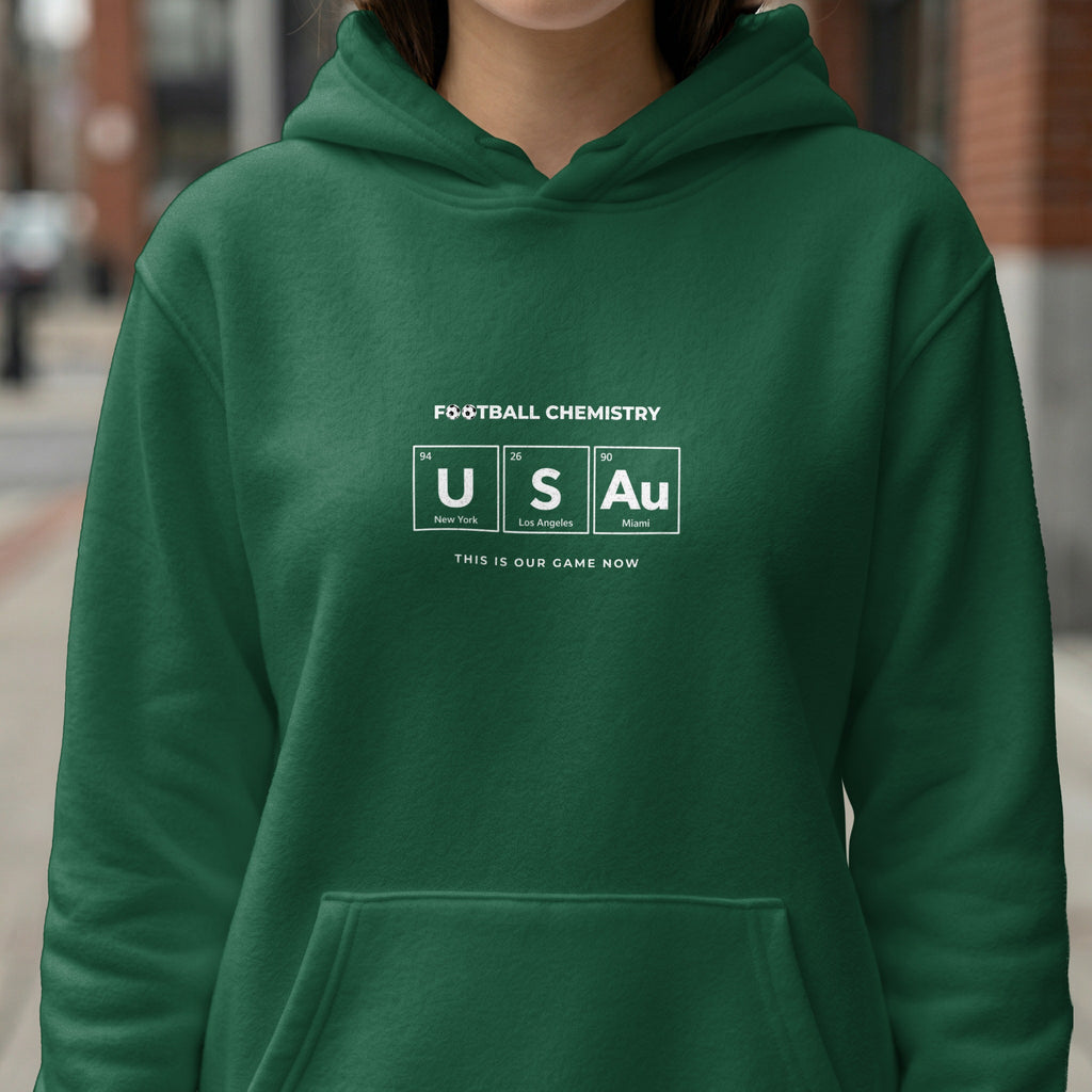 Green hoodie with "FOOTBALL CHEMISTRY" and elemental symbols for USA.