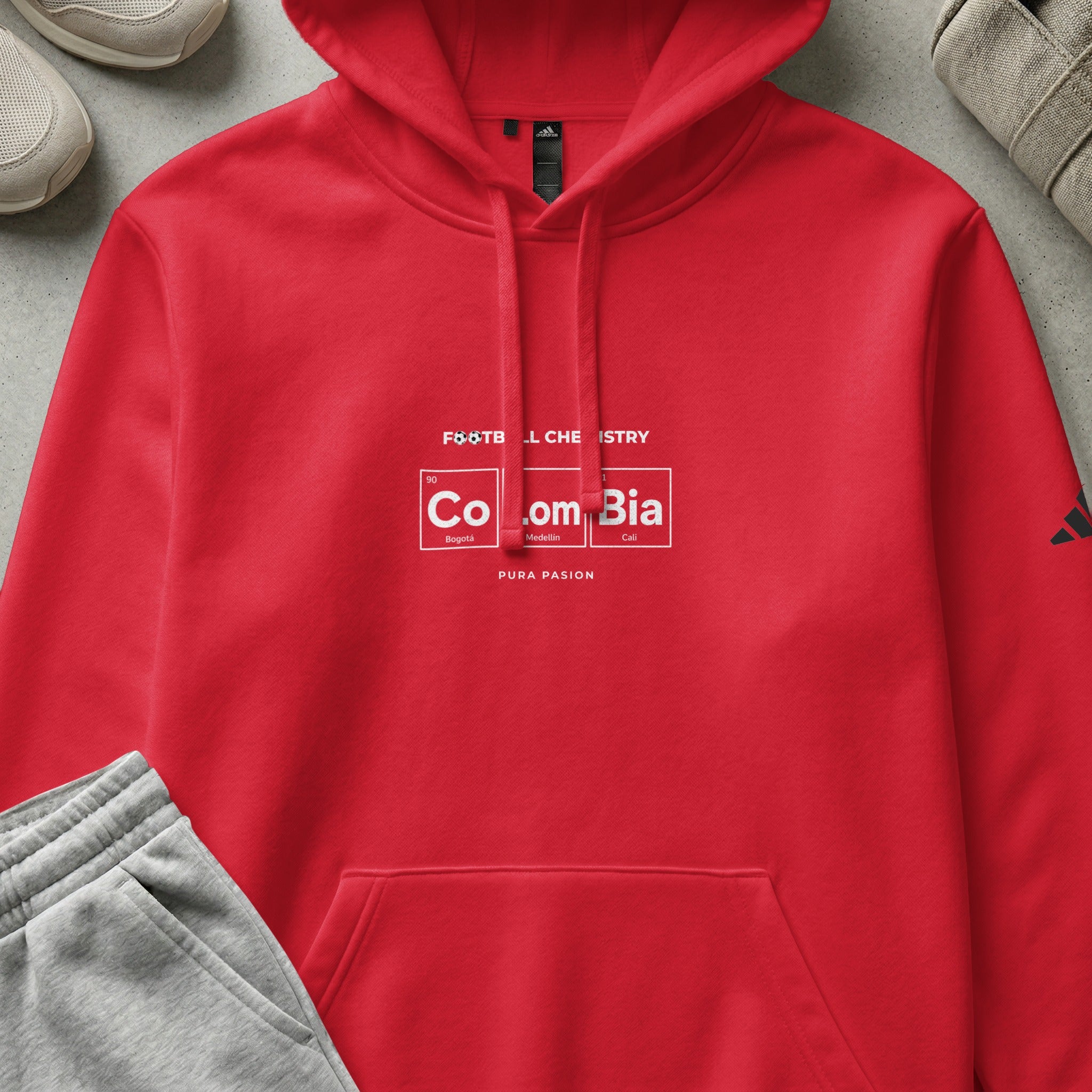 Red hoodie with "FOOTBALL CHEMISTRY" and "Colombia" in periodic table style.
