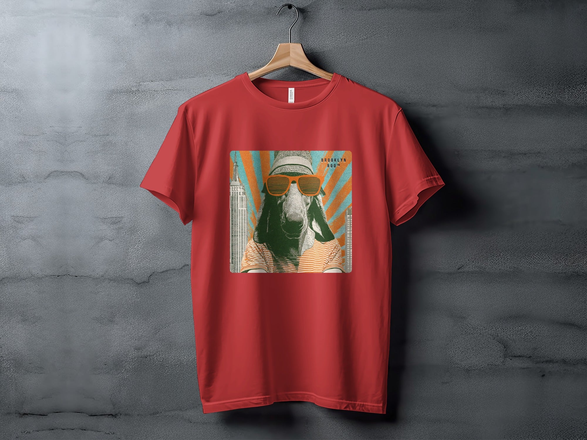 Red t-shirt with graphic of goat wearing sunglasses and Brooklyn logo.