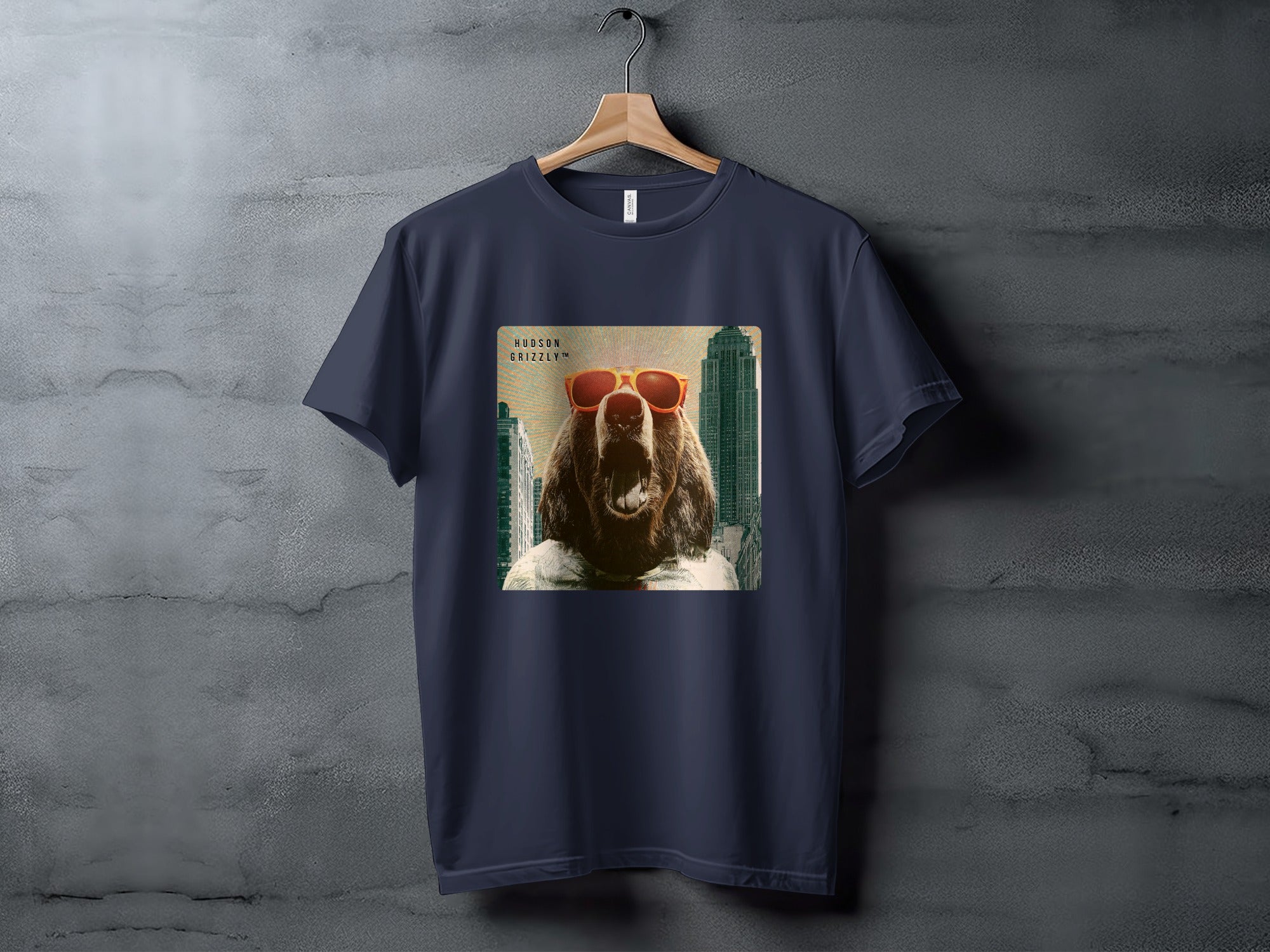 Dark t-shirt featuring a bear wearing sunglasses in a city.