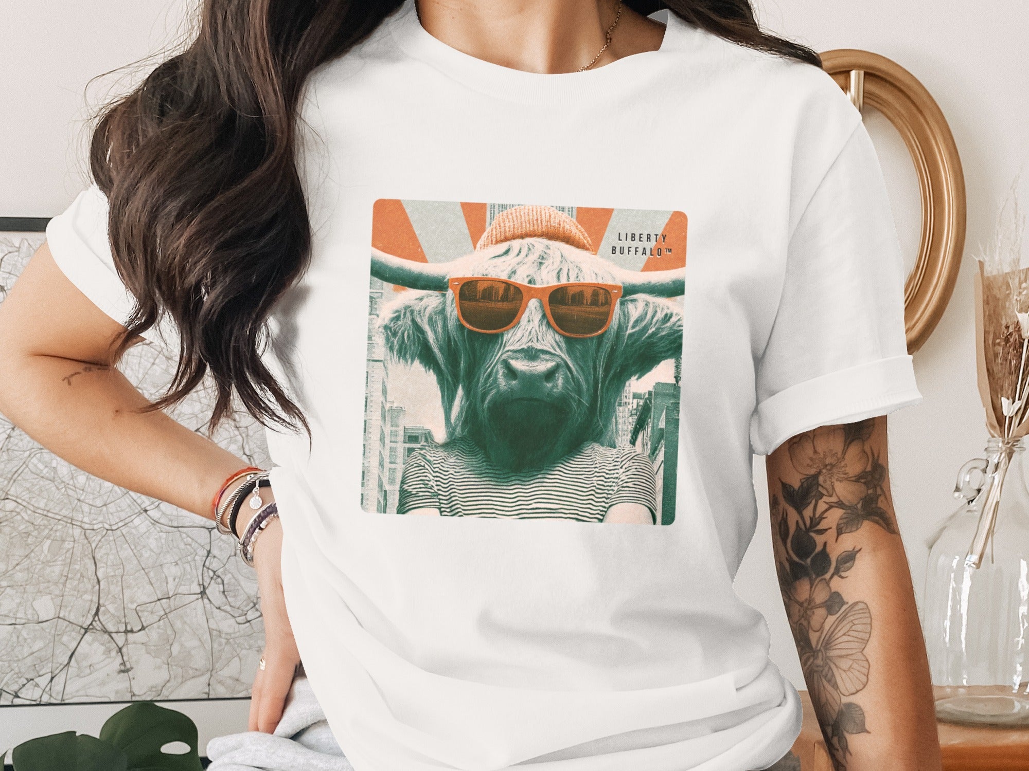 T-shirt featuring a stylized buffalo wearing sunglasses and a beanie with the Union Jack.