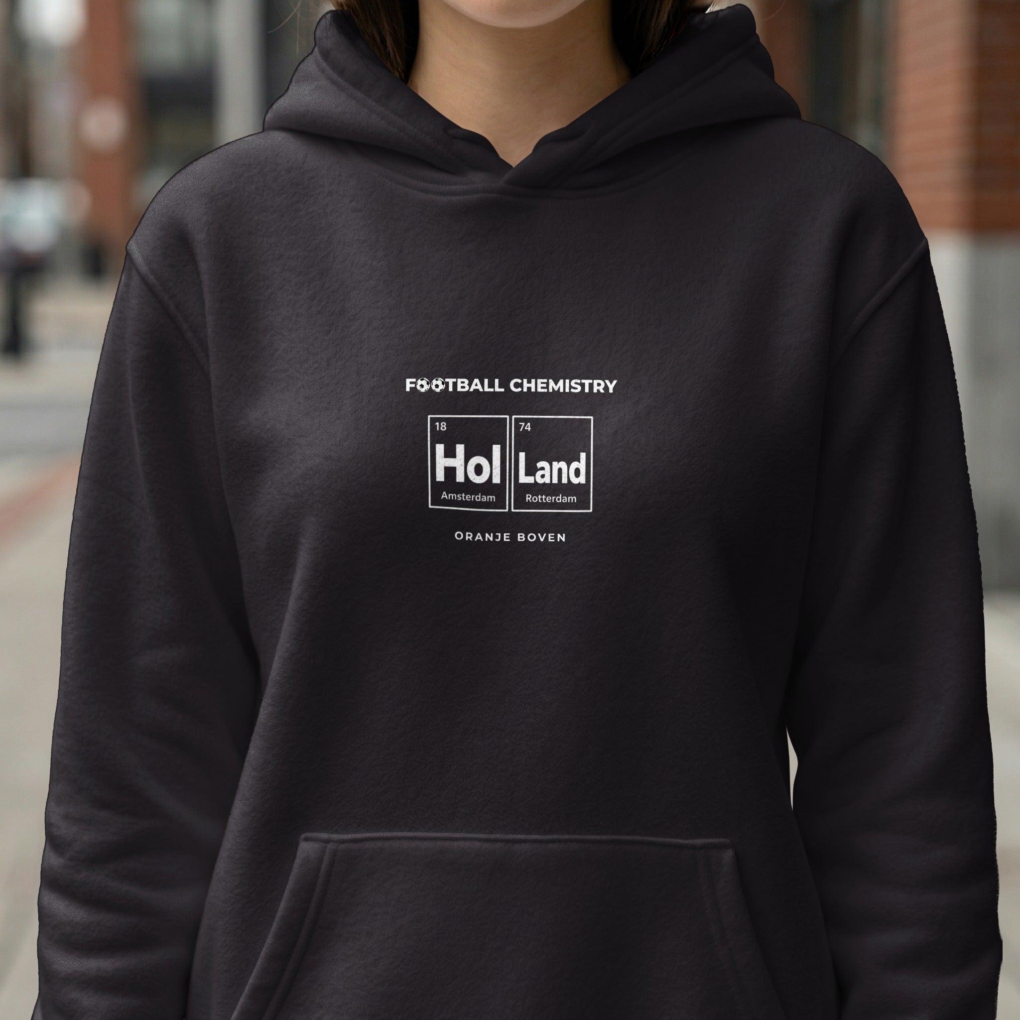 Black hoodie with "Football Chemistry" and "Holland" in periodic table style.