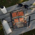 Spiral notebook with "Holland Terrace Edition" text and football-themed graphics.